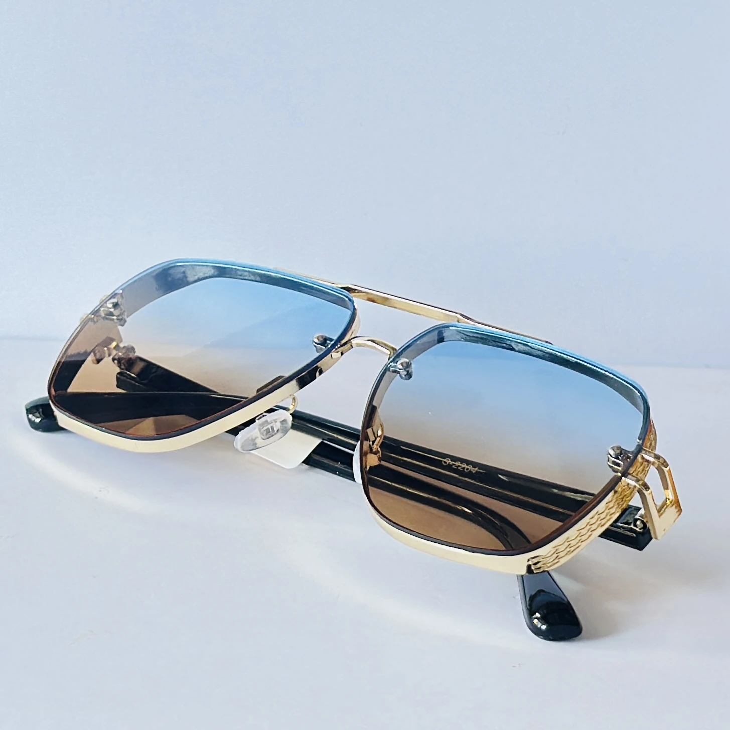 sunglasses appear to be the Maybach