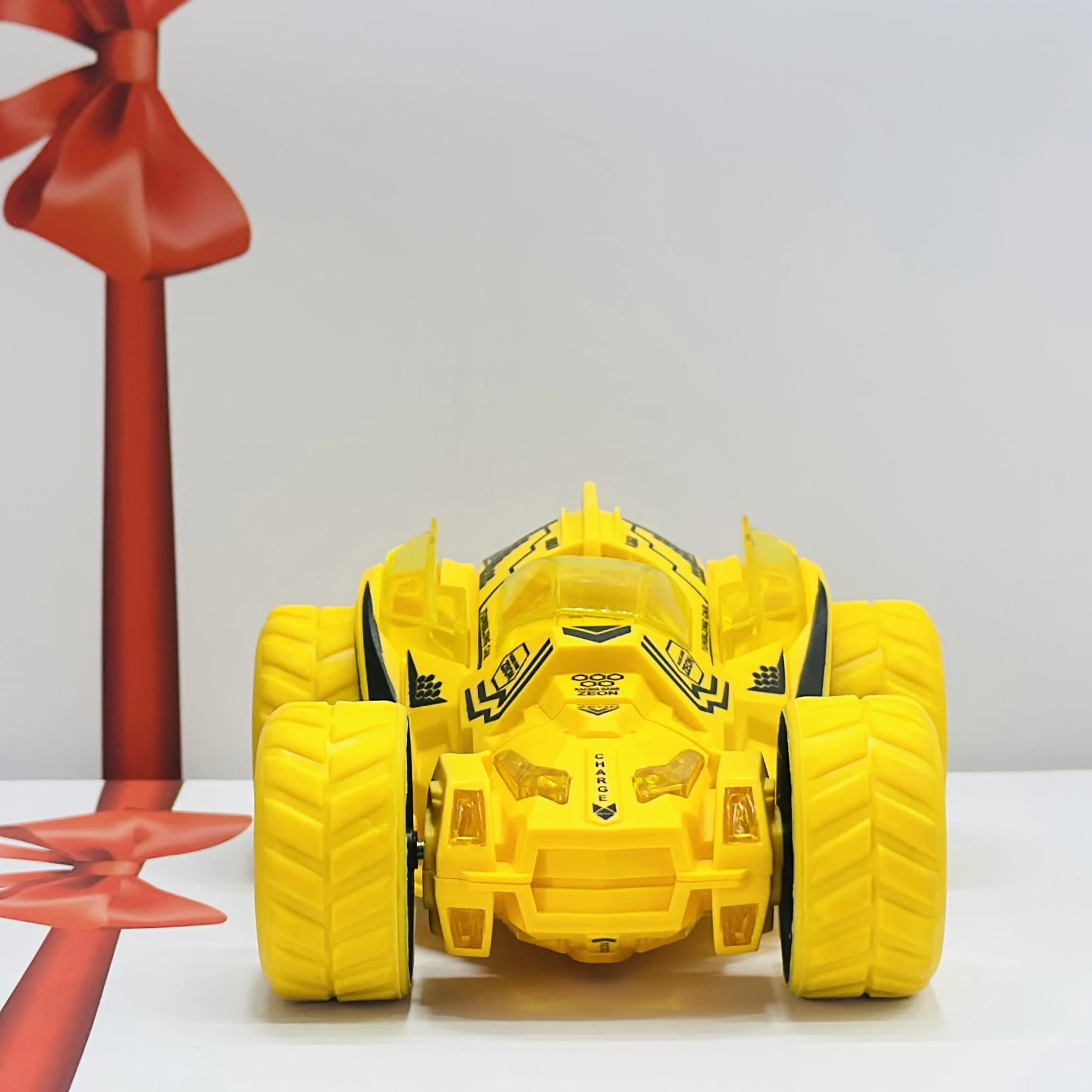 friction-powered toy stunt car