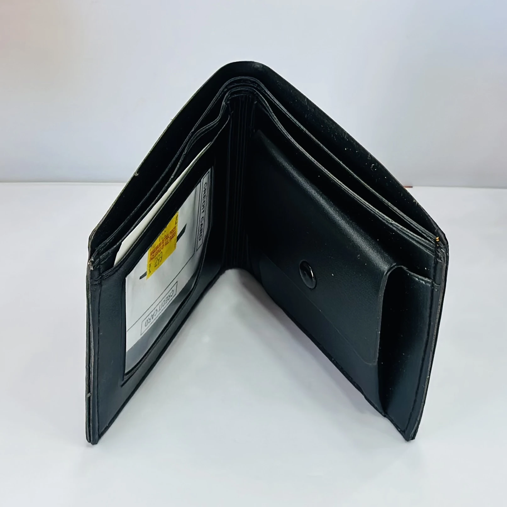 Versace Medusa Biggie bi-fold wallet in black leather.