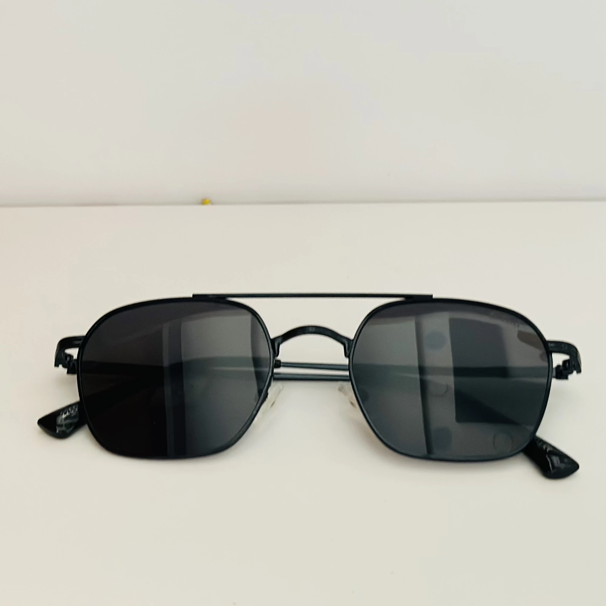 Tommy Hilfiger TH 1671/S sunglasses in black with grey lenses.