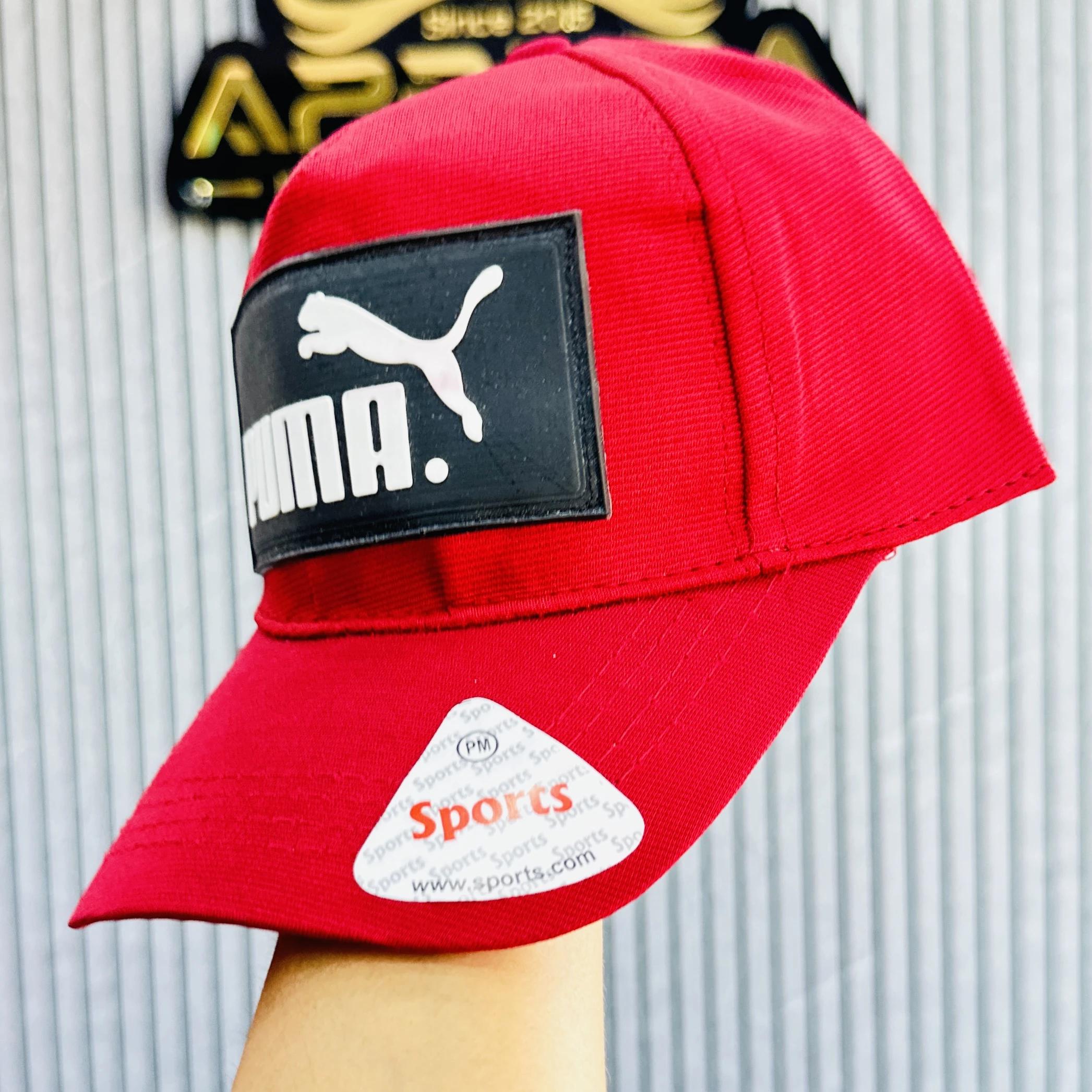 Red PUMA baseball cap,