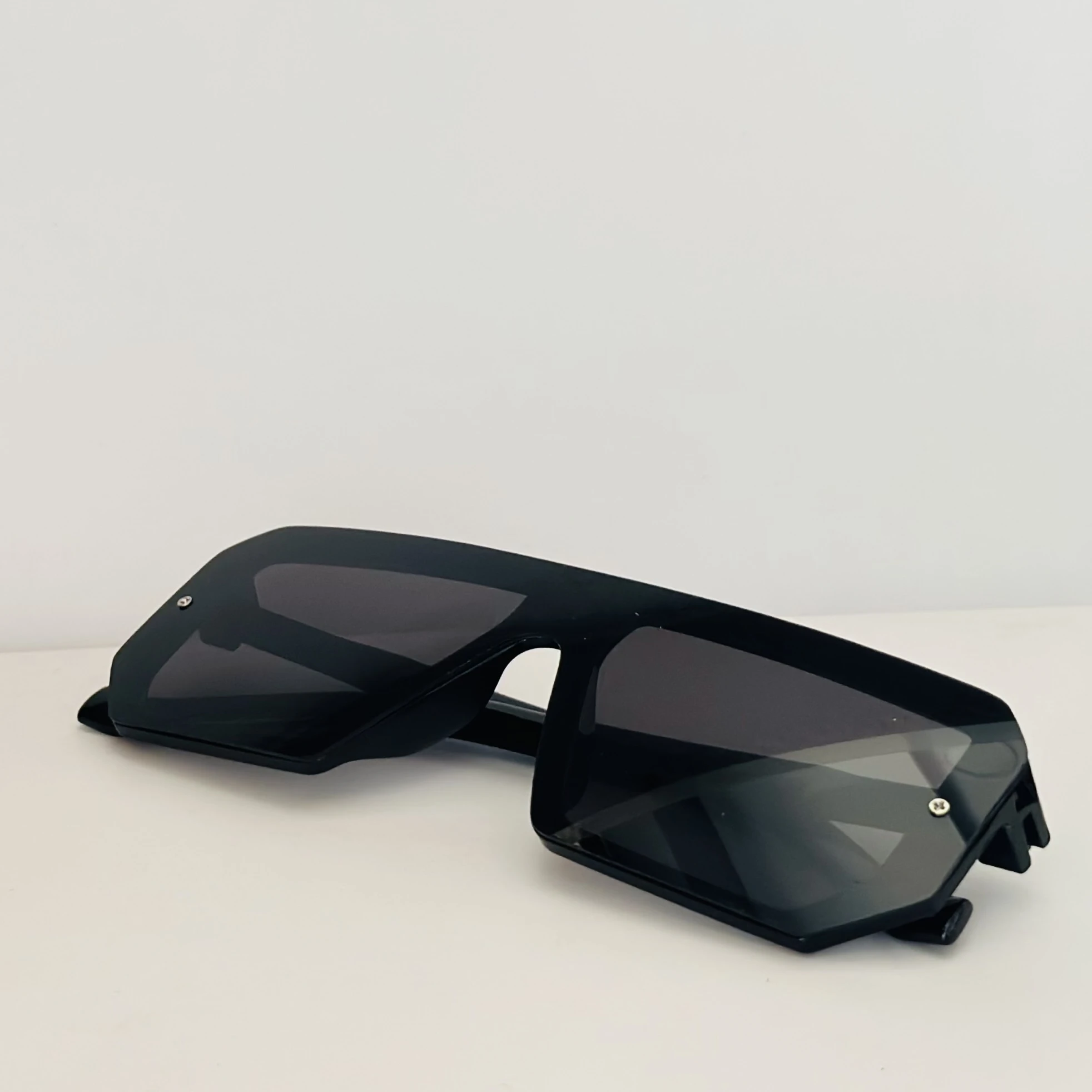 black oversized square flat top sunglasses with a visor design.