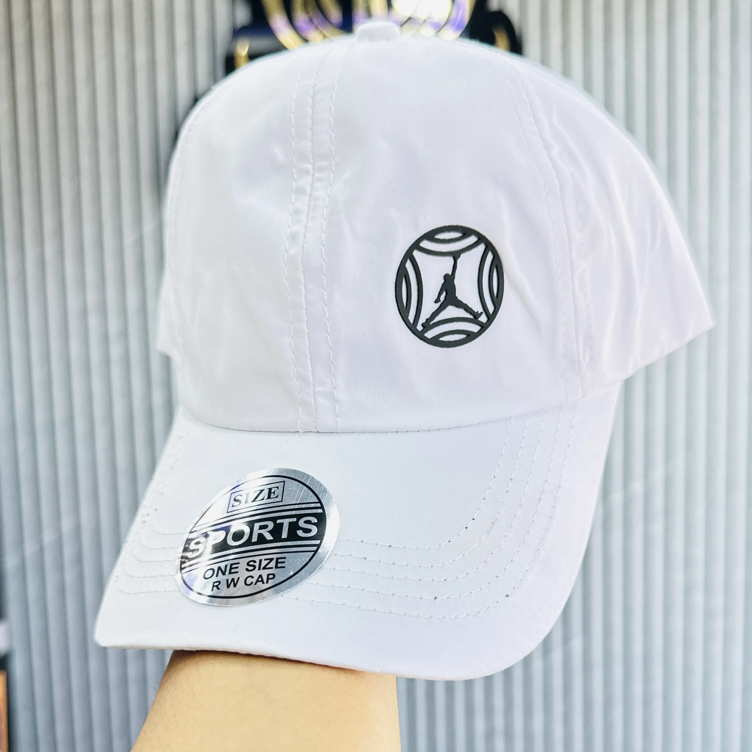 appears to be a white Nike branded baseball cap