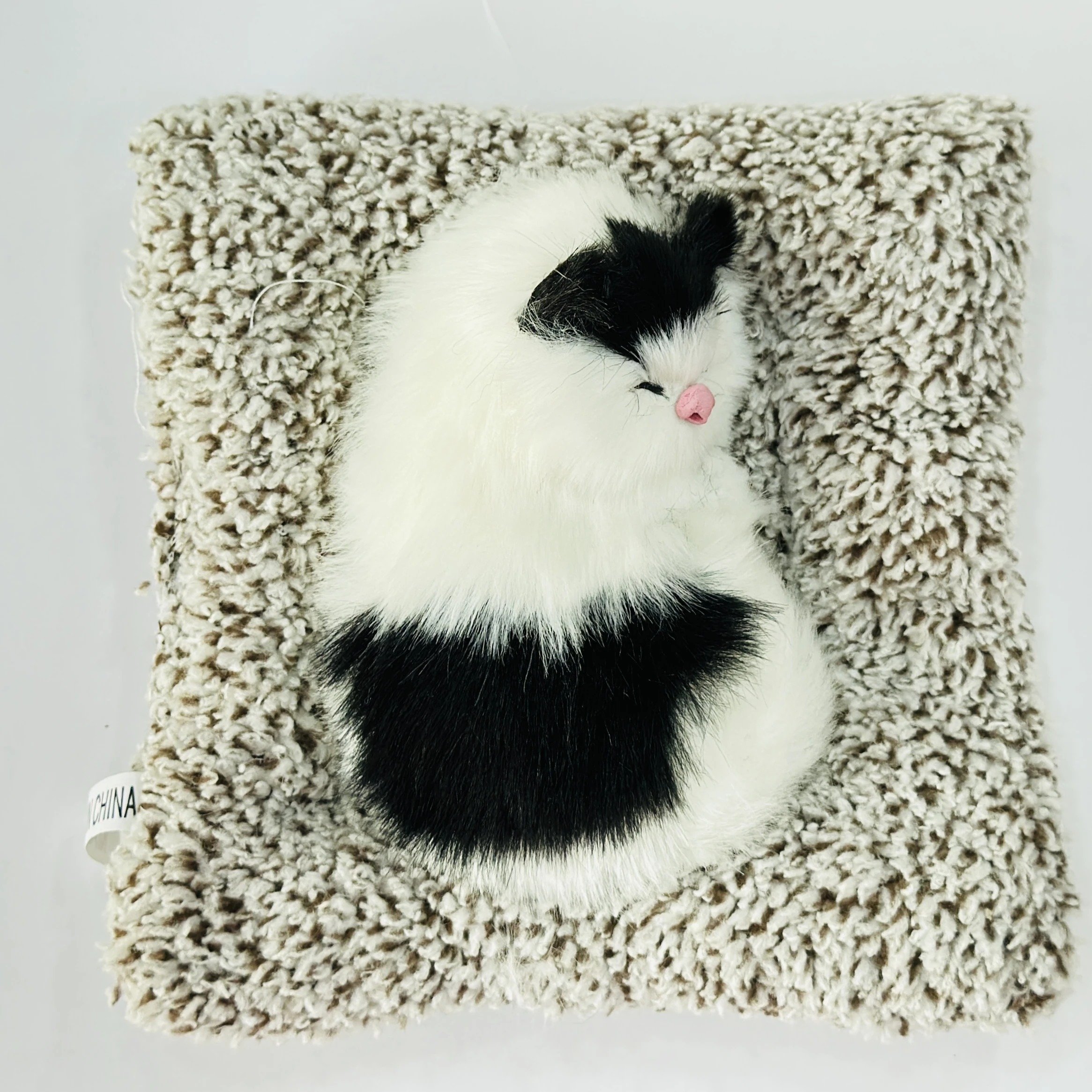 Sleeping cat plush toy