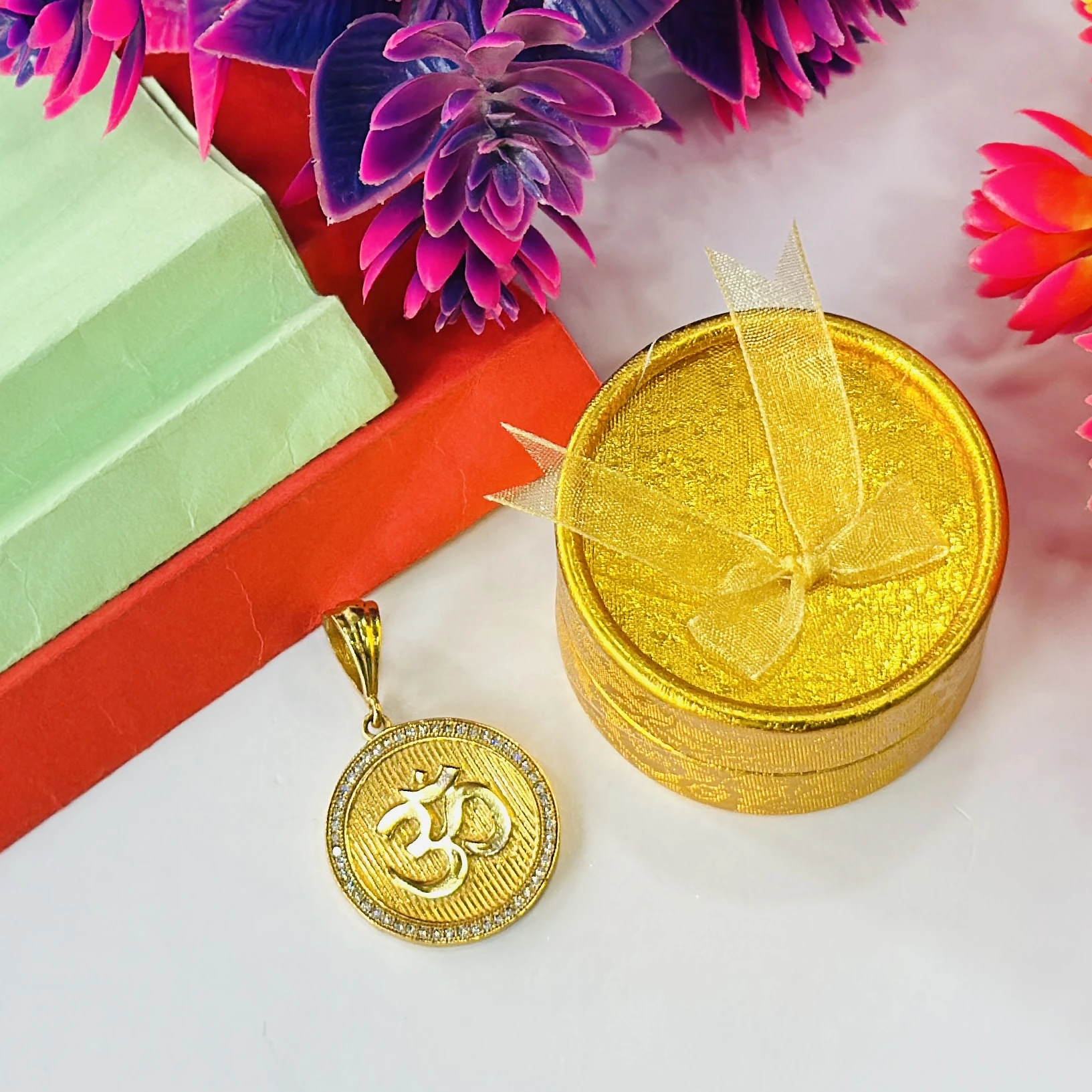 Round gold and diamond Om pendant