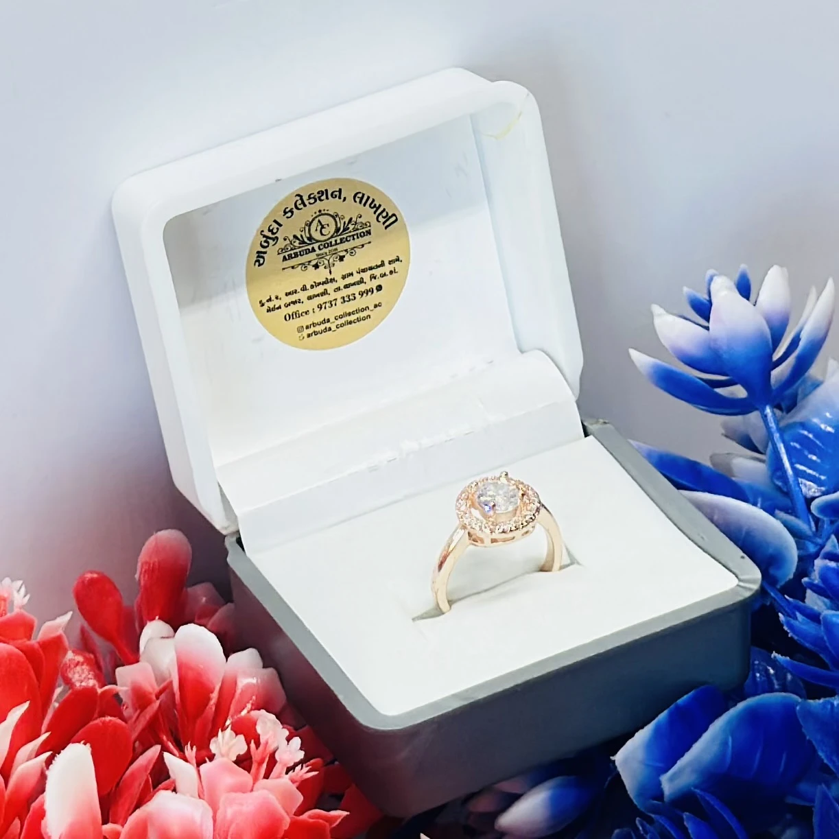 Brass gold-plated CZ stone-studded finger ring.