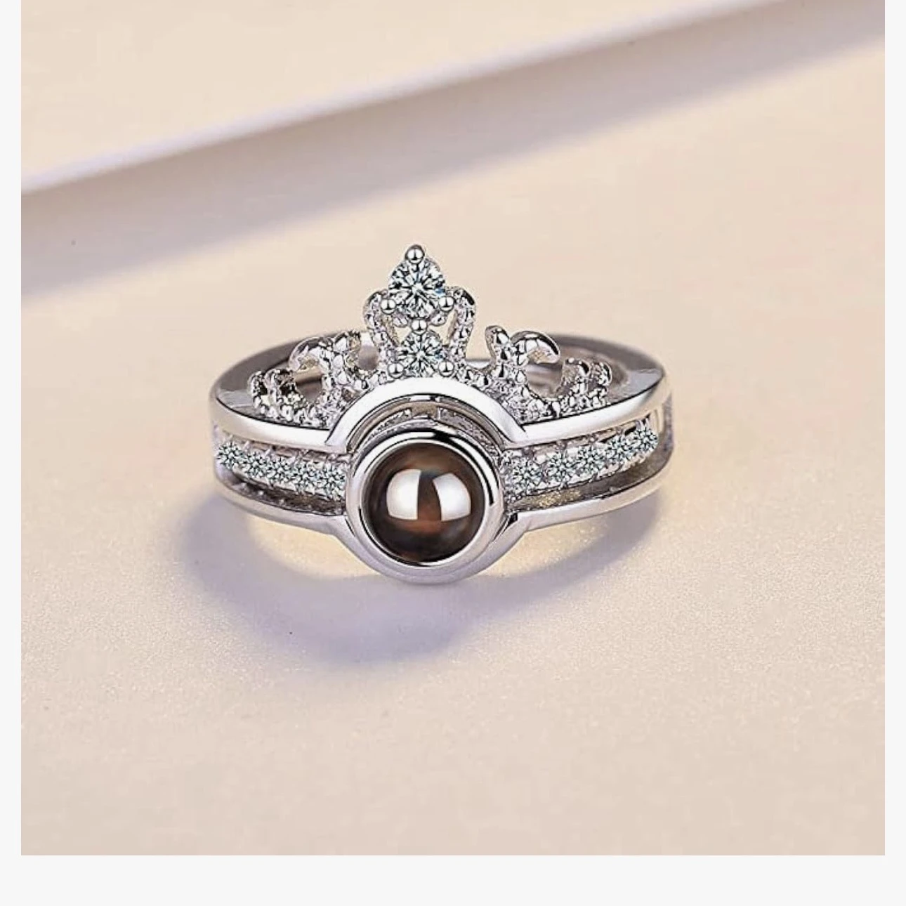 an adjustable silver-plated crown projection ring