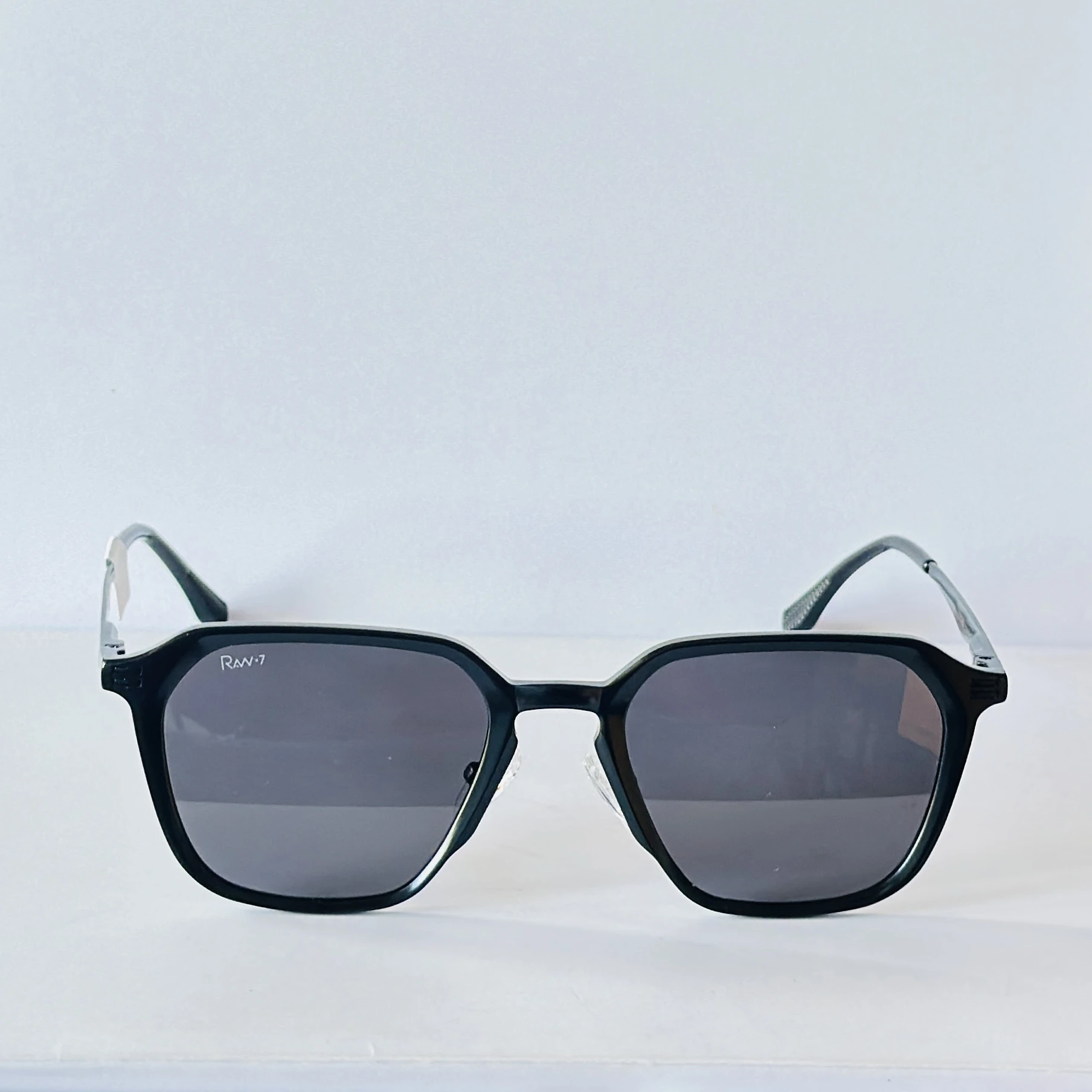 Rav-7 sunglasses feature a retro square black metal frame