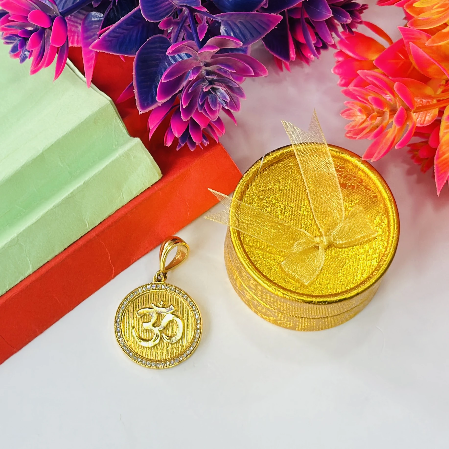 Round gold and diamond Om pendant
