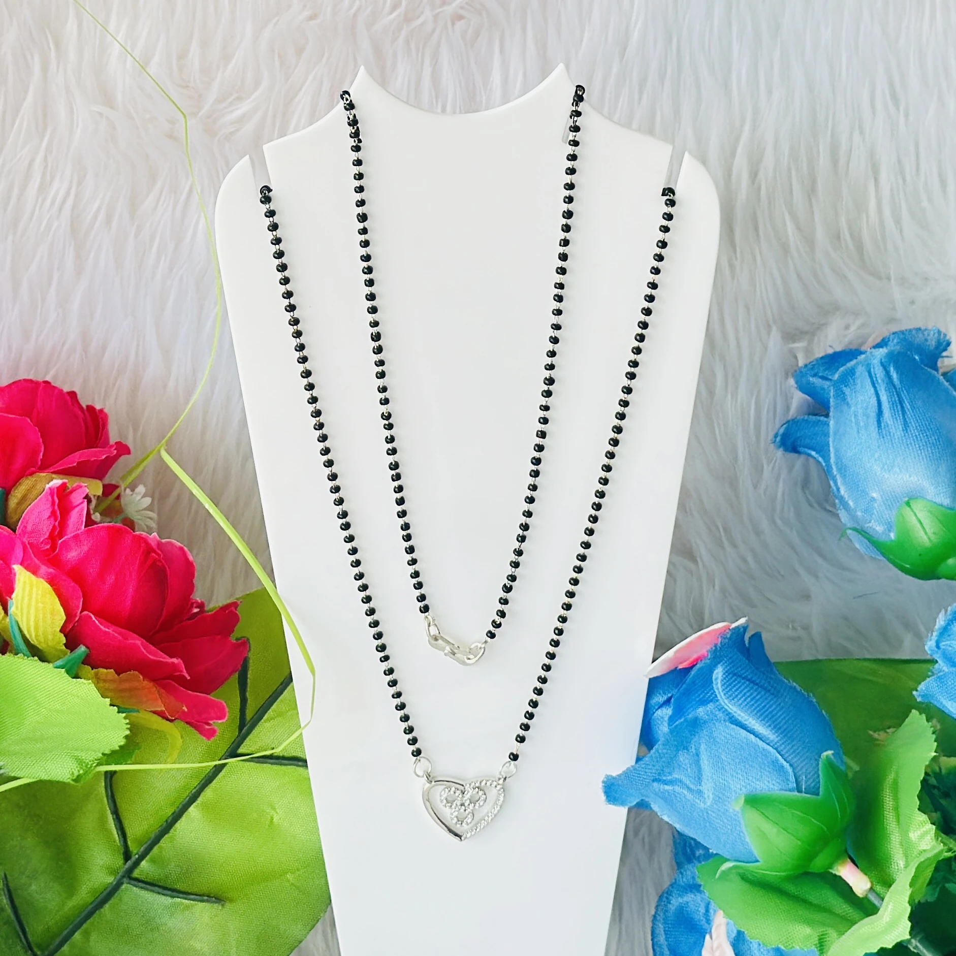 silver-plated American diamond studded and beaded mangalsutra.