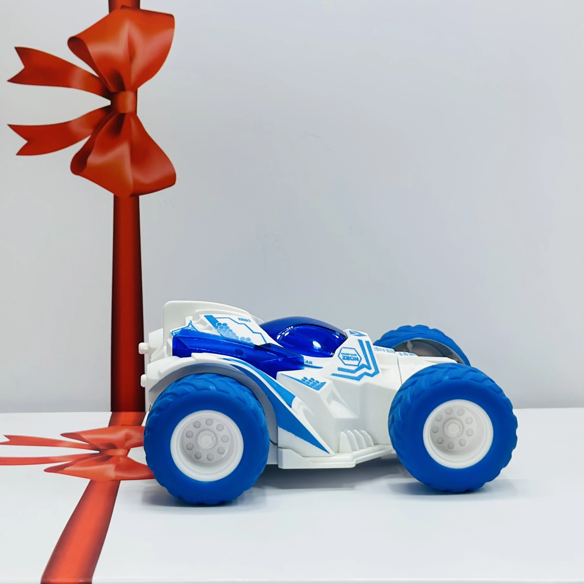 friction-powered toy stunt car