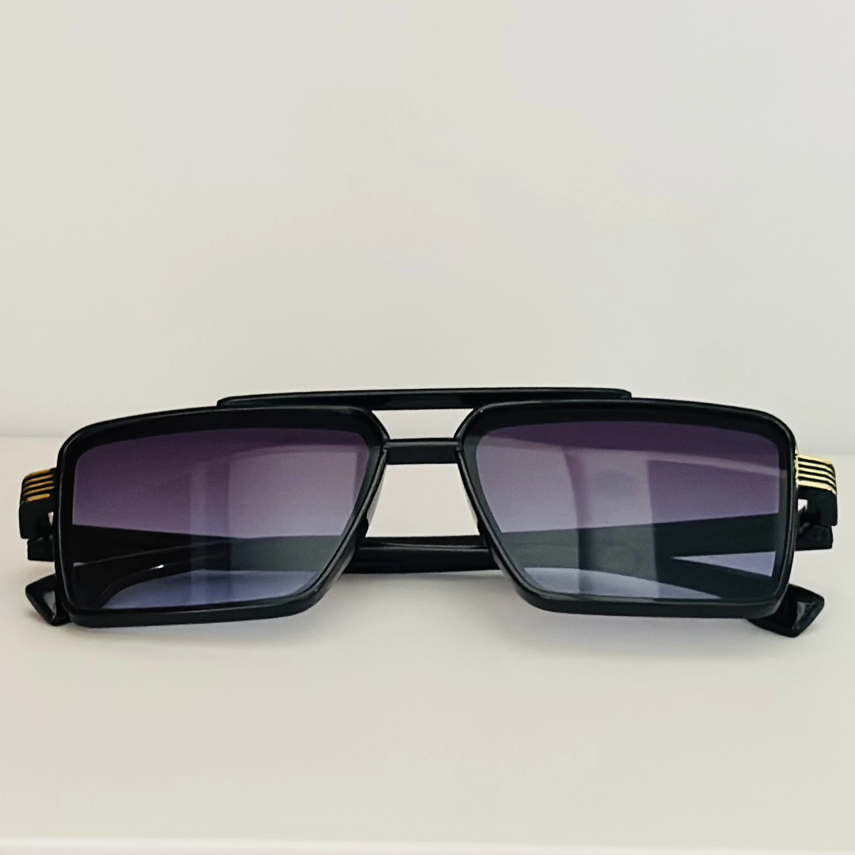 square sunglasses with a black frame