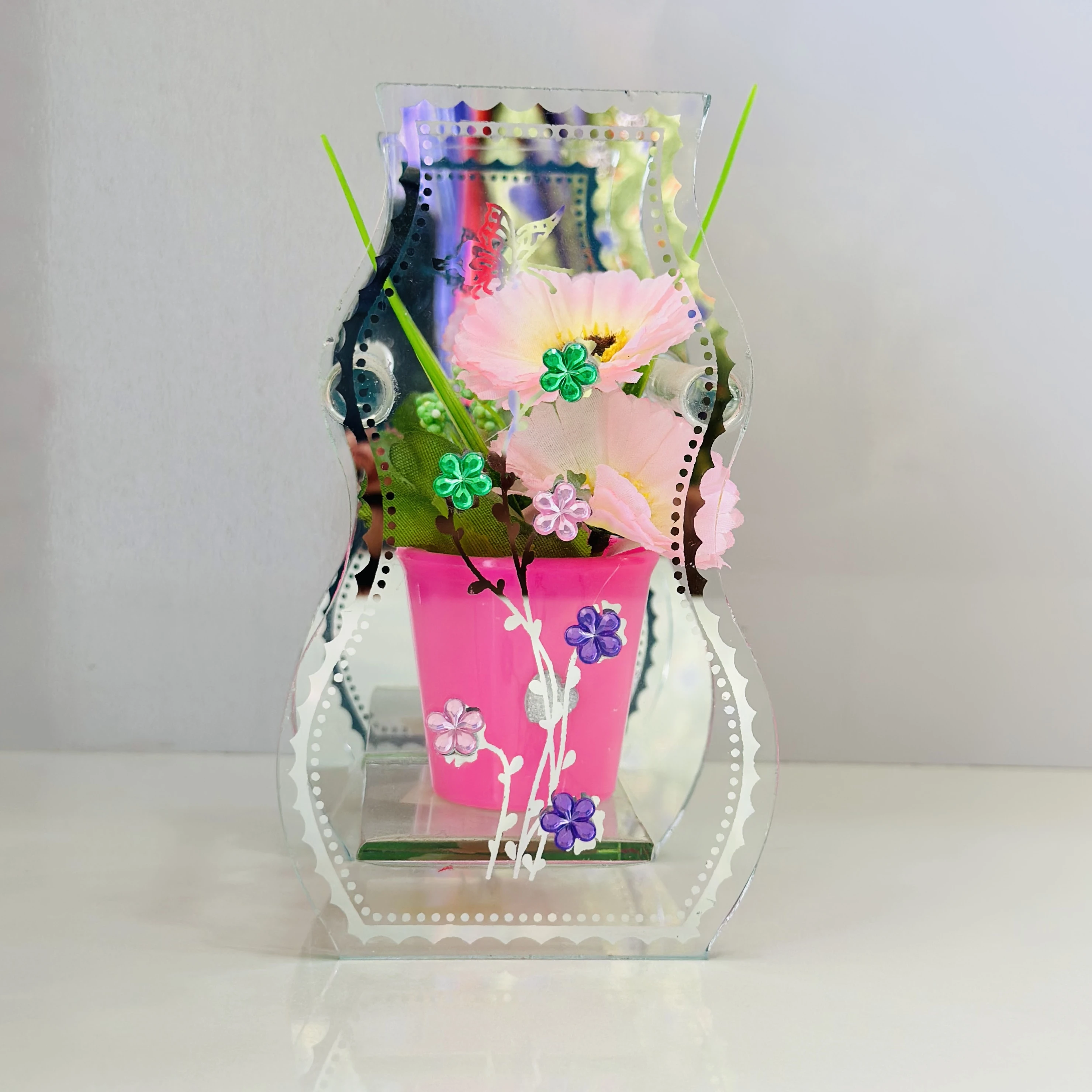 decorative glass vase with a purple pot and artificial flowers inside.(SKU-7QH3CH)