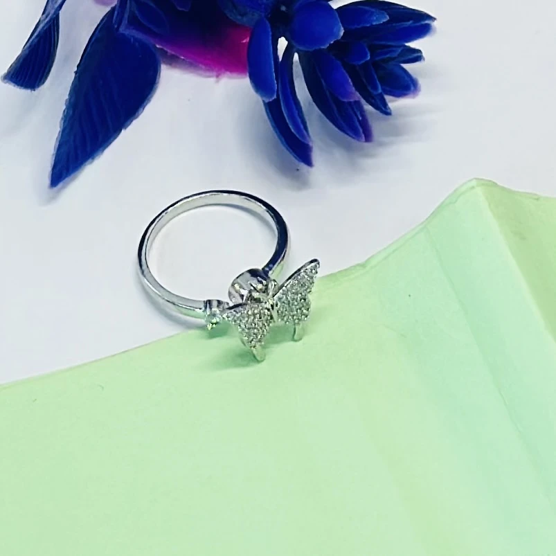 An adjustable silver-plated butterfly ring