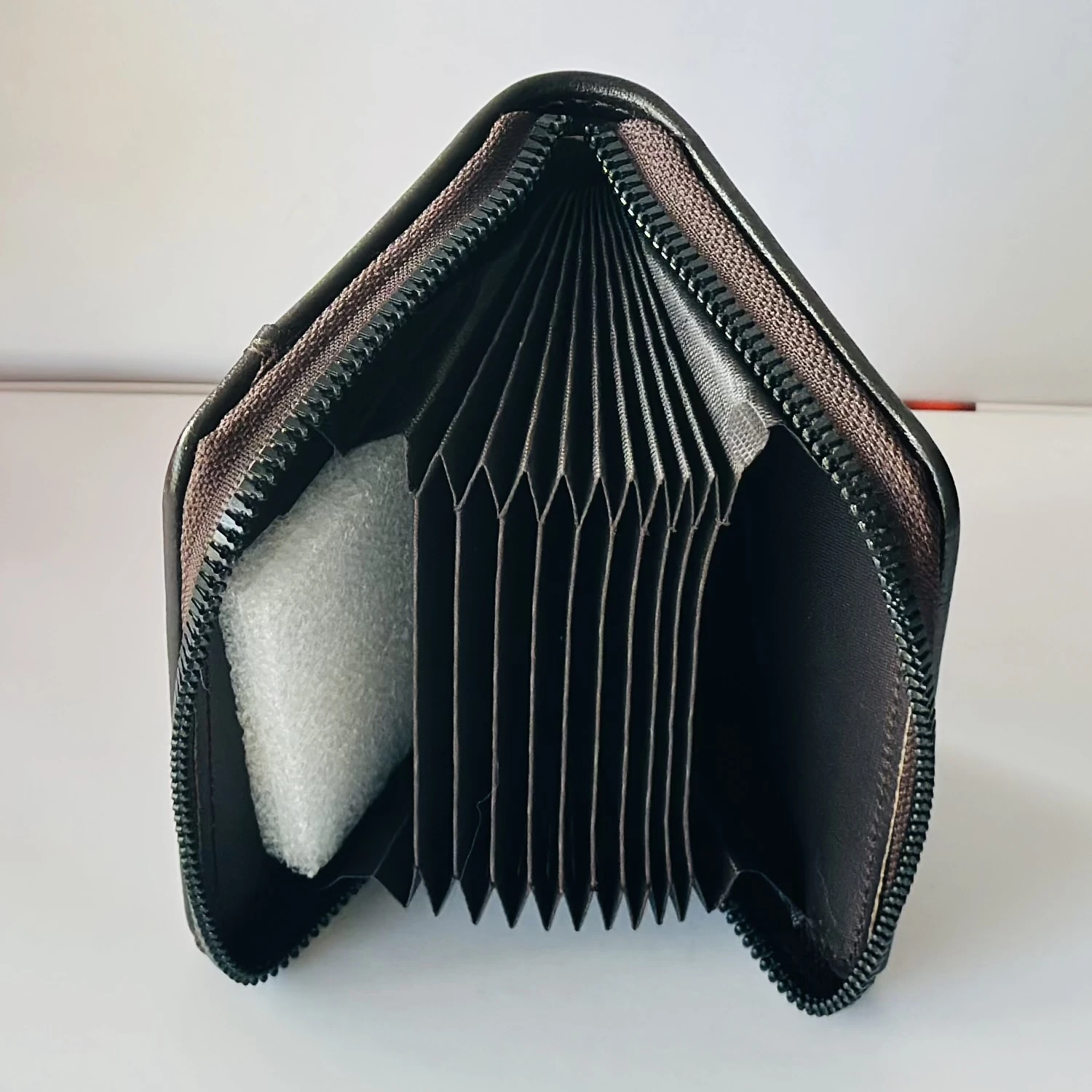 Black bi-fold leather wallet by Balisi