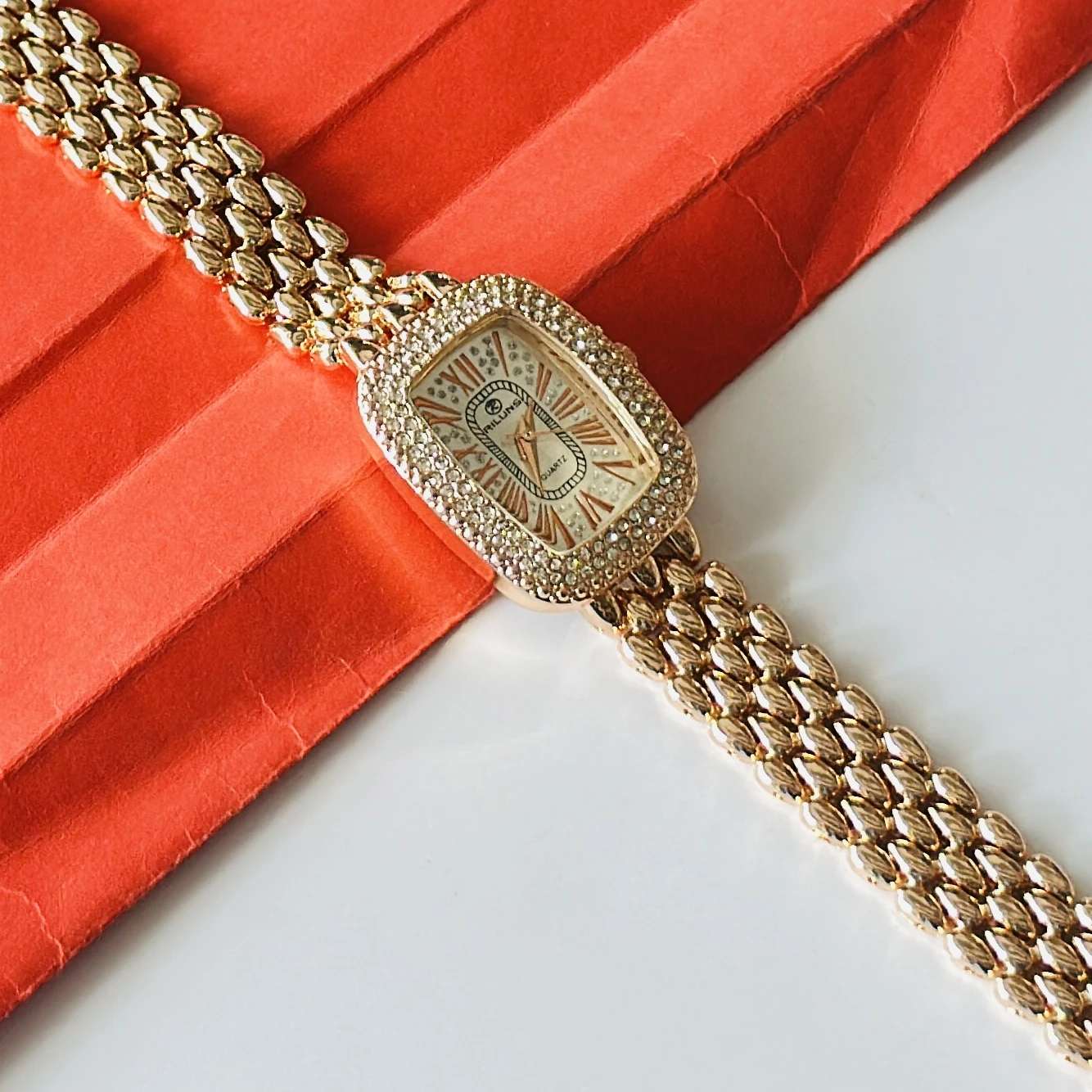 Haute Sauce embellished rose gold-tone bracelet watch