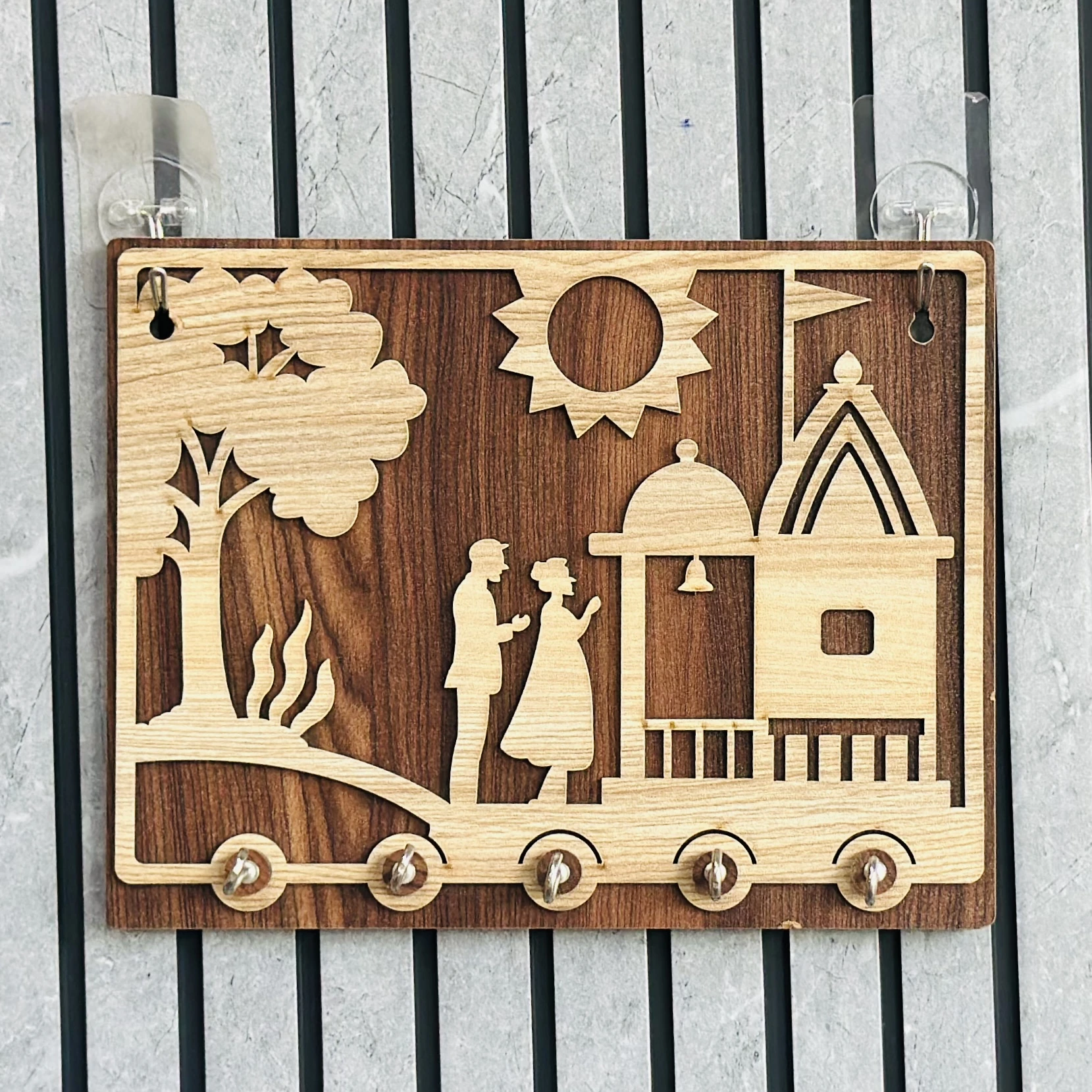Wooden key holder with a decorative design(SKU-9XQ2BZ)