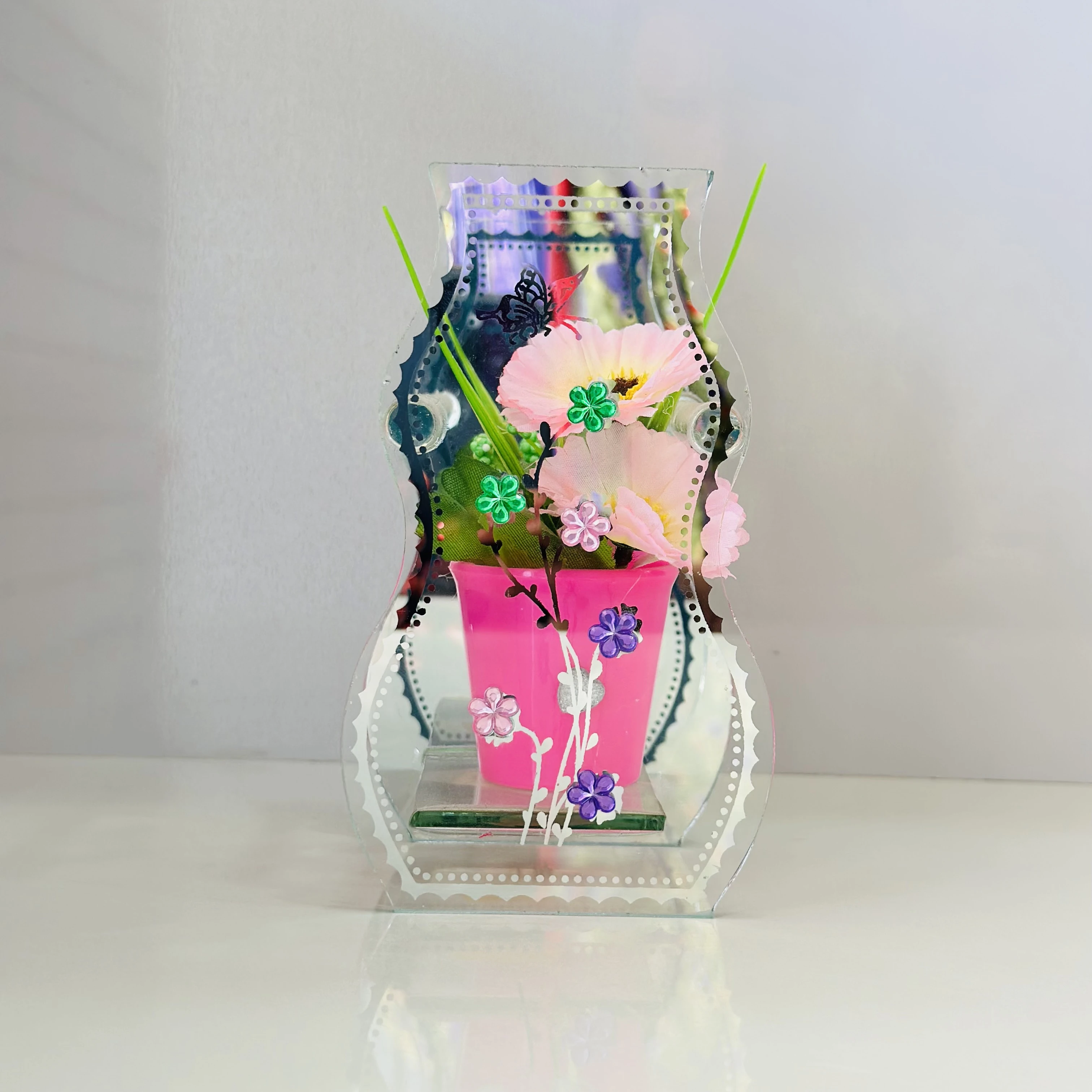 decorative glass vase with a purple pot and artificial flowers inside.(SKU-7QH3CH)