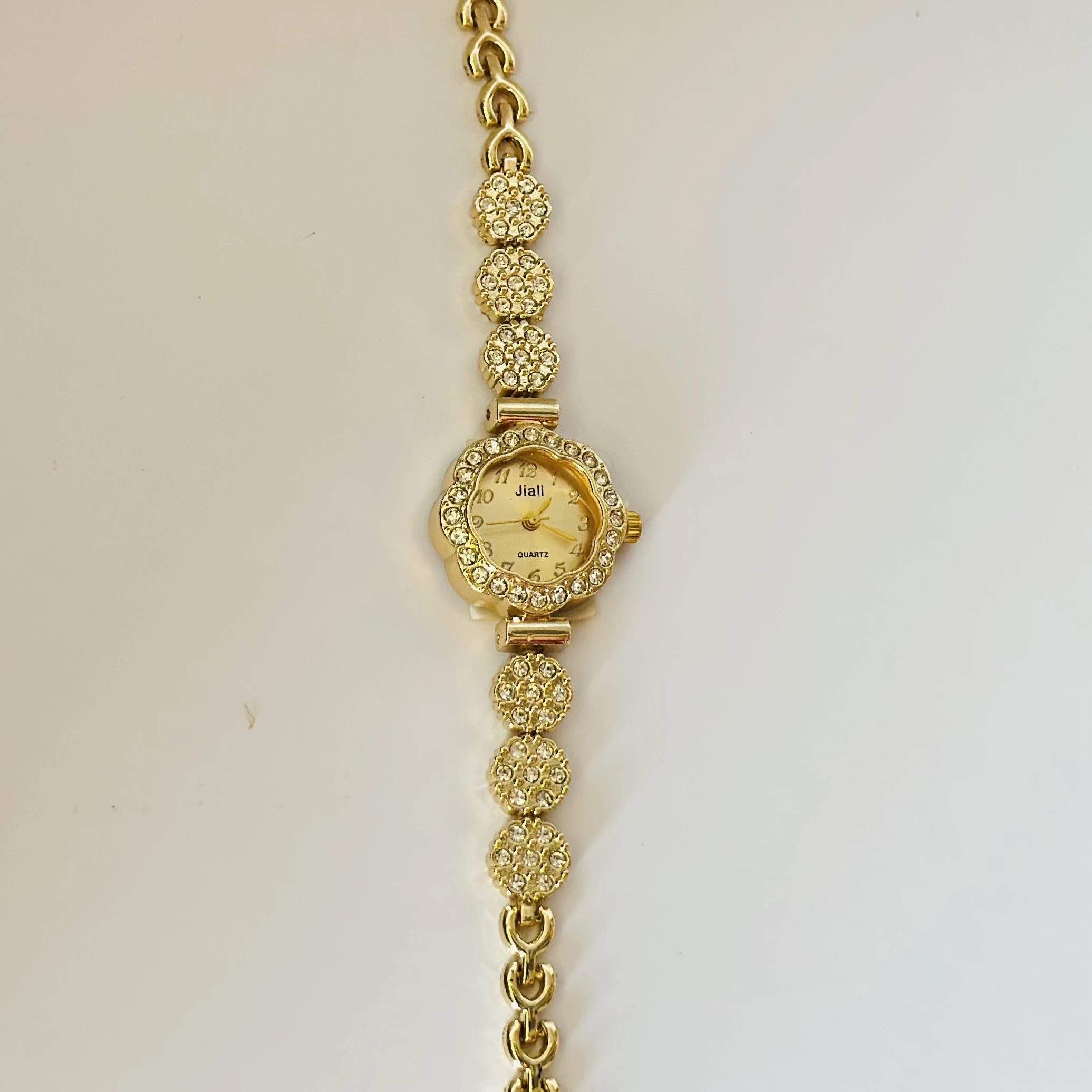 Gold tone quartz watch