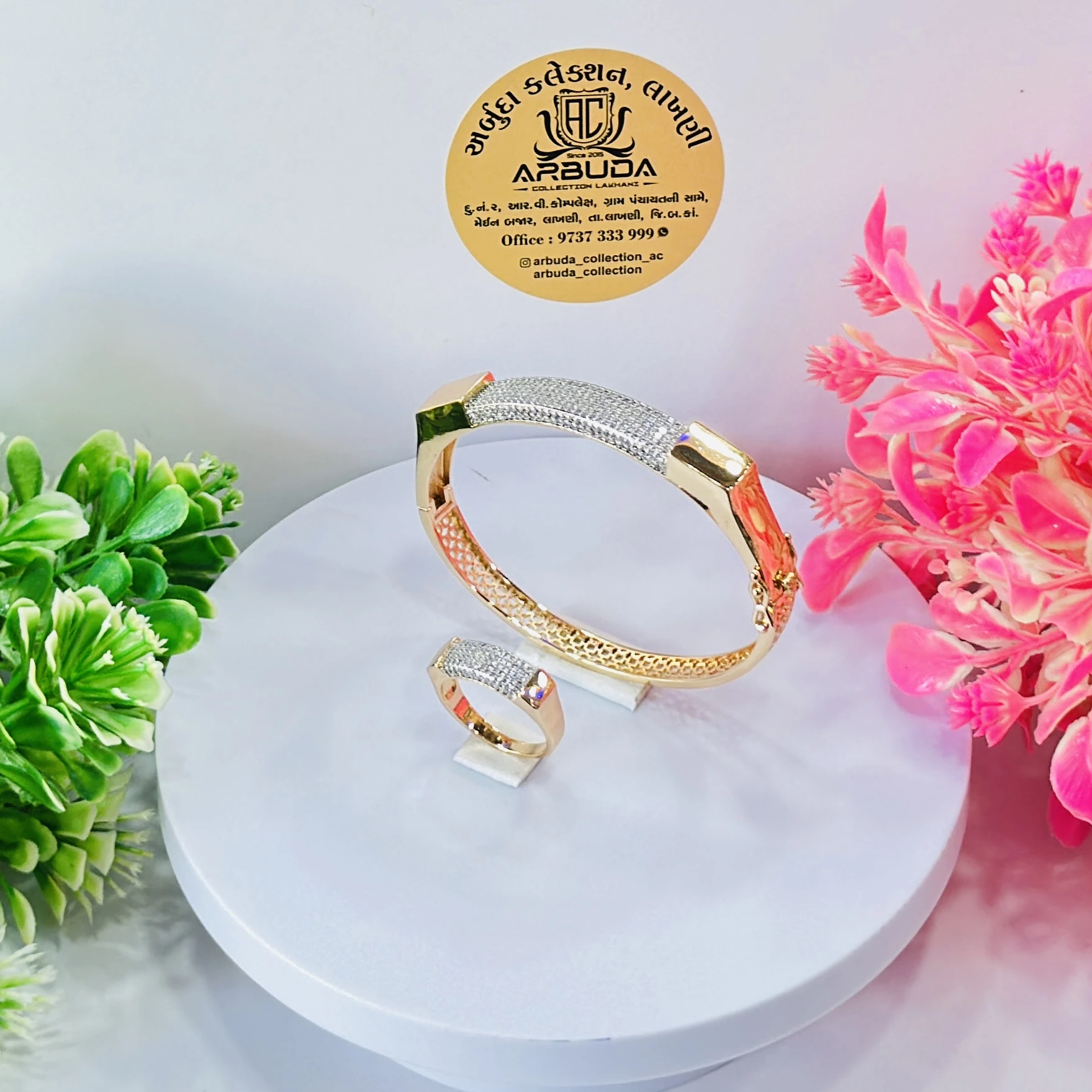 Gold toned Kada  and ring set