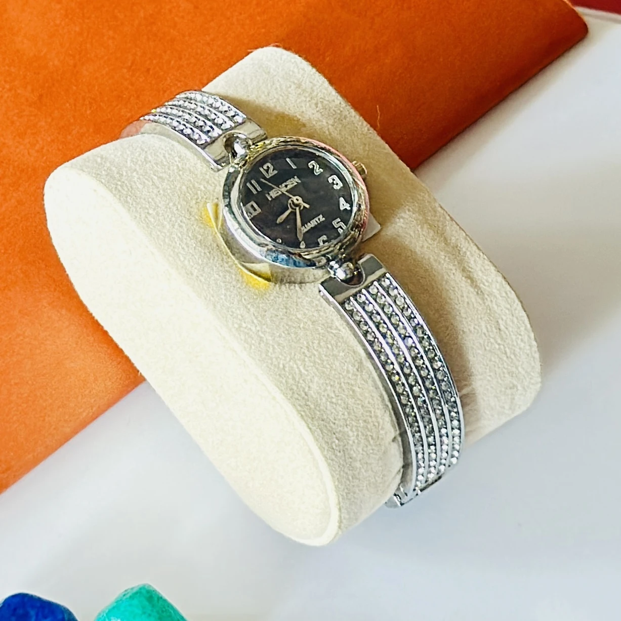 silver-toned women's quartz bracelet watch