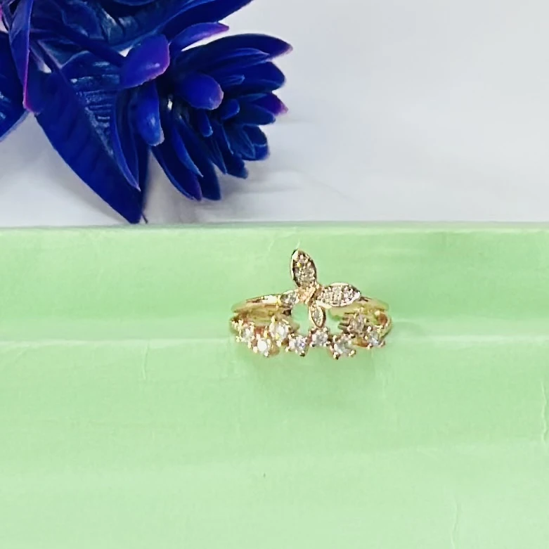 Gold plated alloy butterfly ring with a vintage style and clear stones.