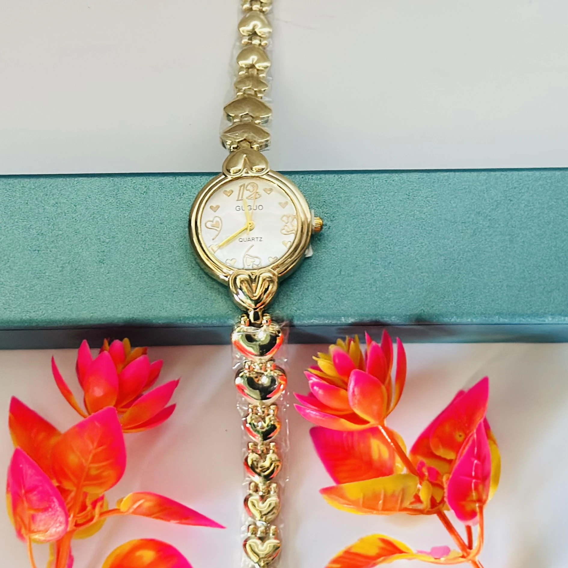 Rose gold analog watch