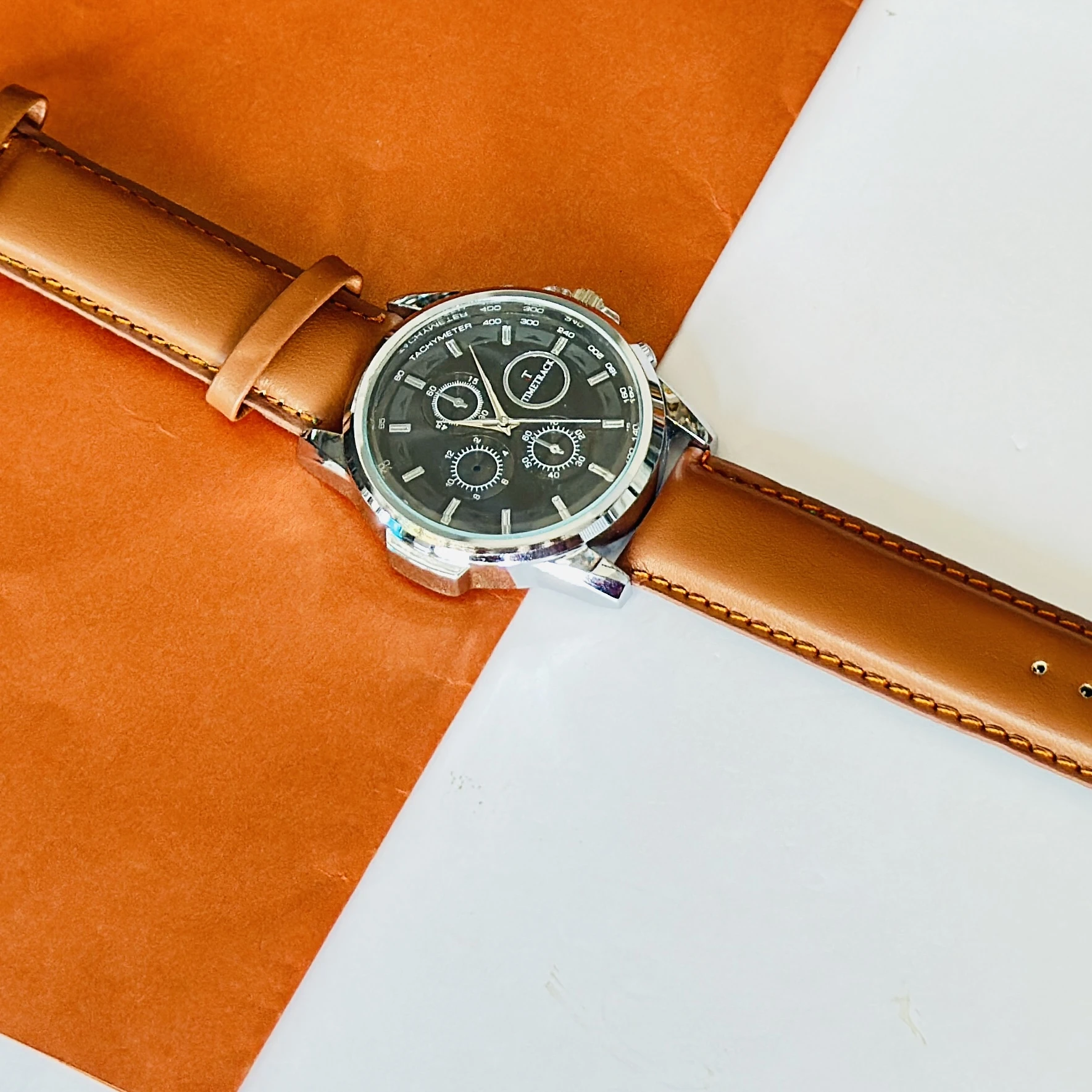 TIMETRACK branded analog watch