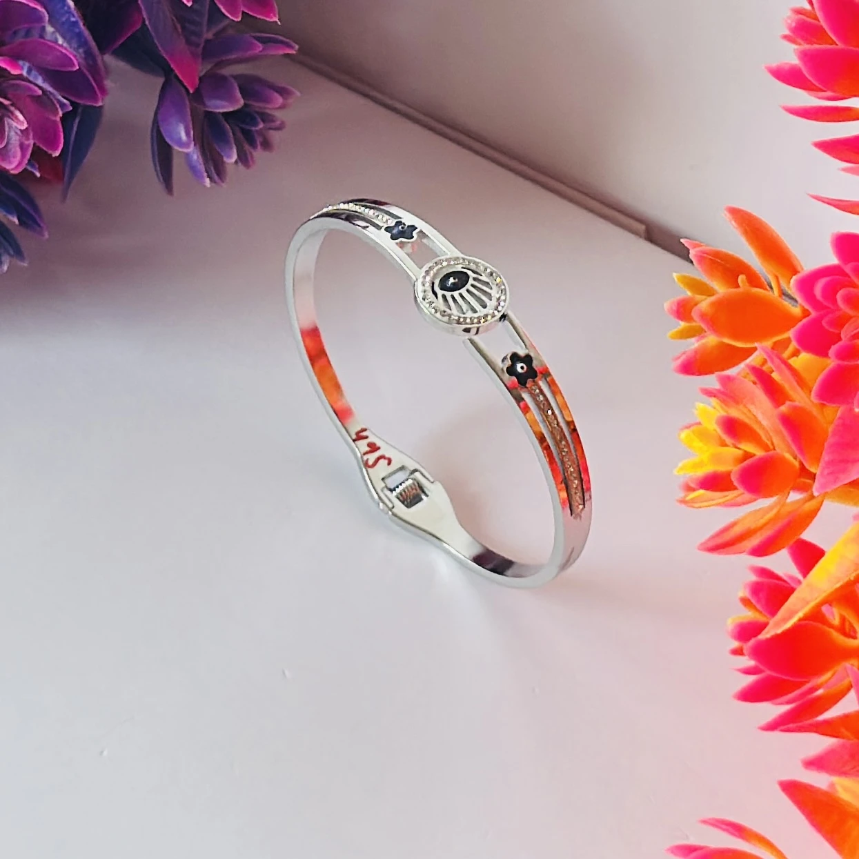 stainless steel silver-plated evil eye bangle bracelet.