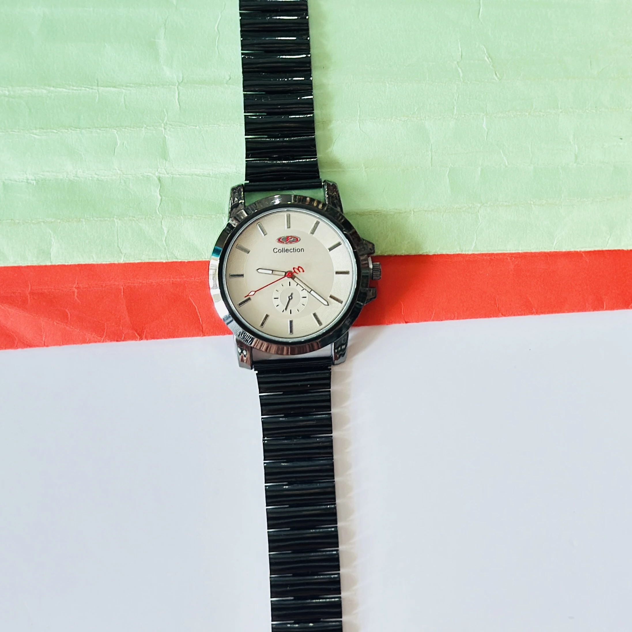 Silver toned analogue watch