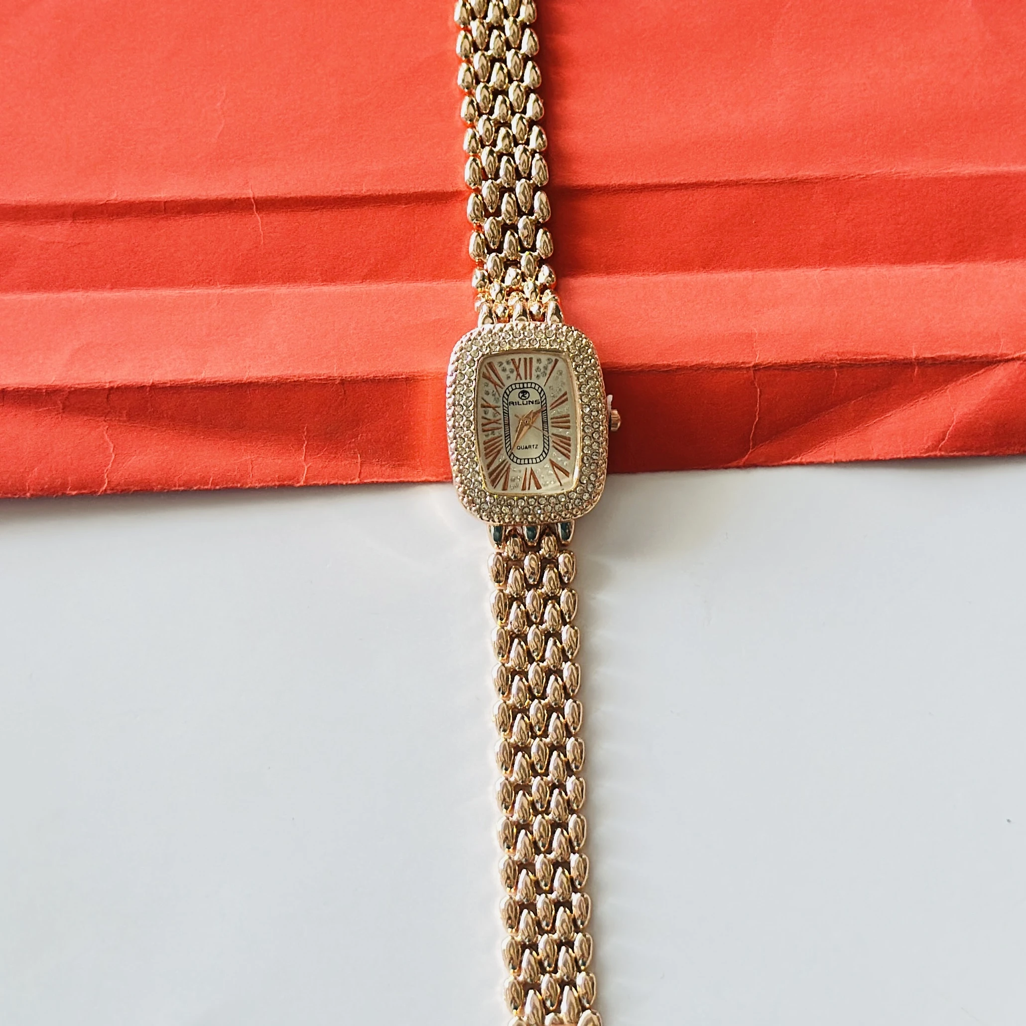 Haute Sauce embellished rose gold-tone bracelet watch