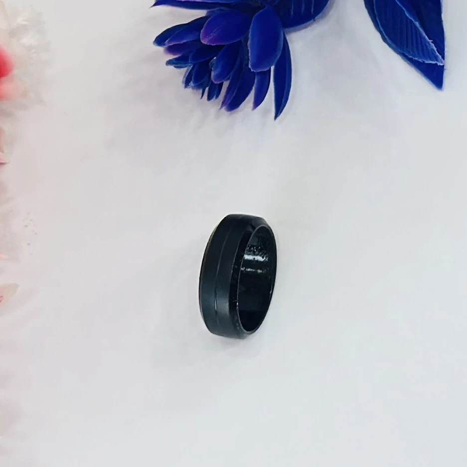 Black stainless steel ring with a square/geometric shape.