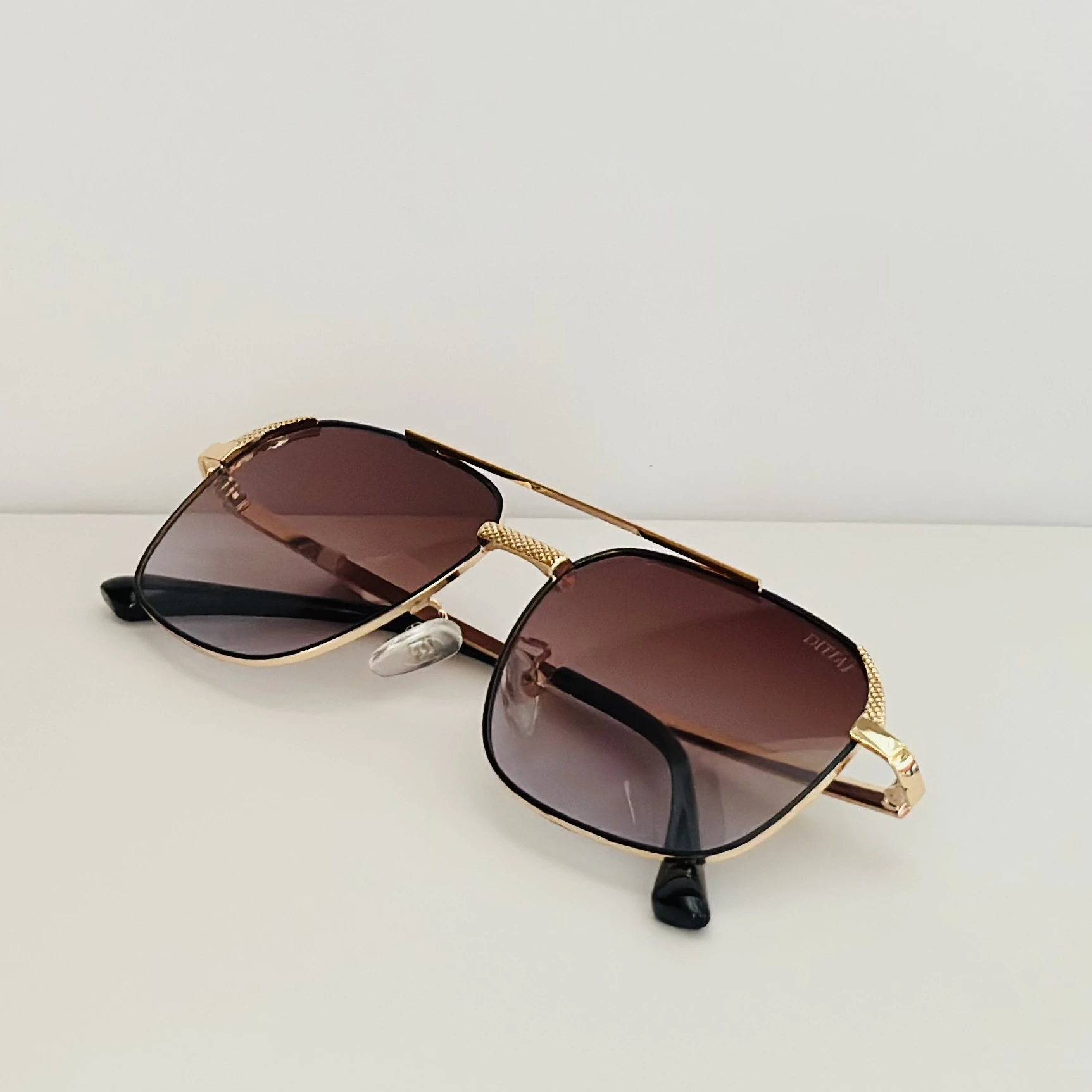 Vincent Chase by Lenskart brown square sunglasses with a golden frame