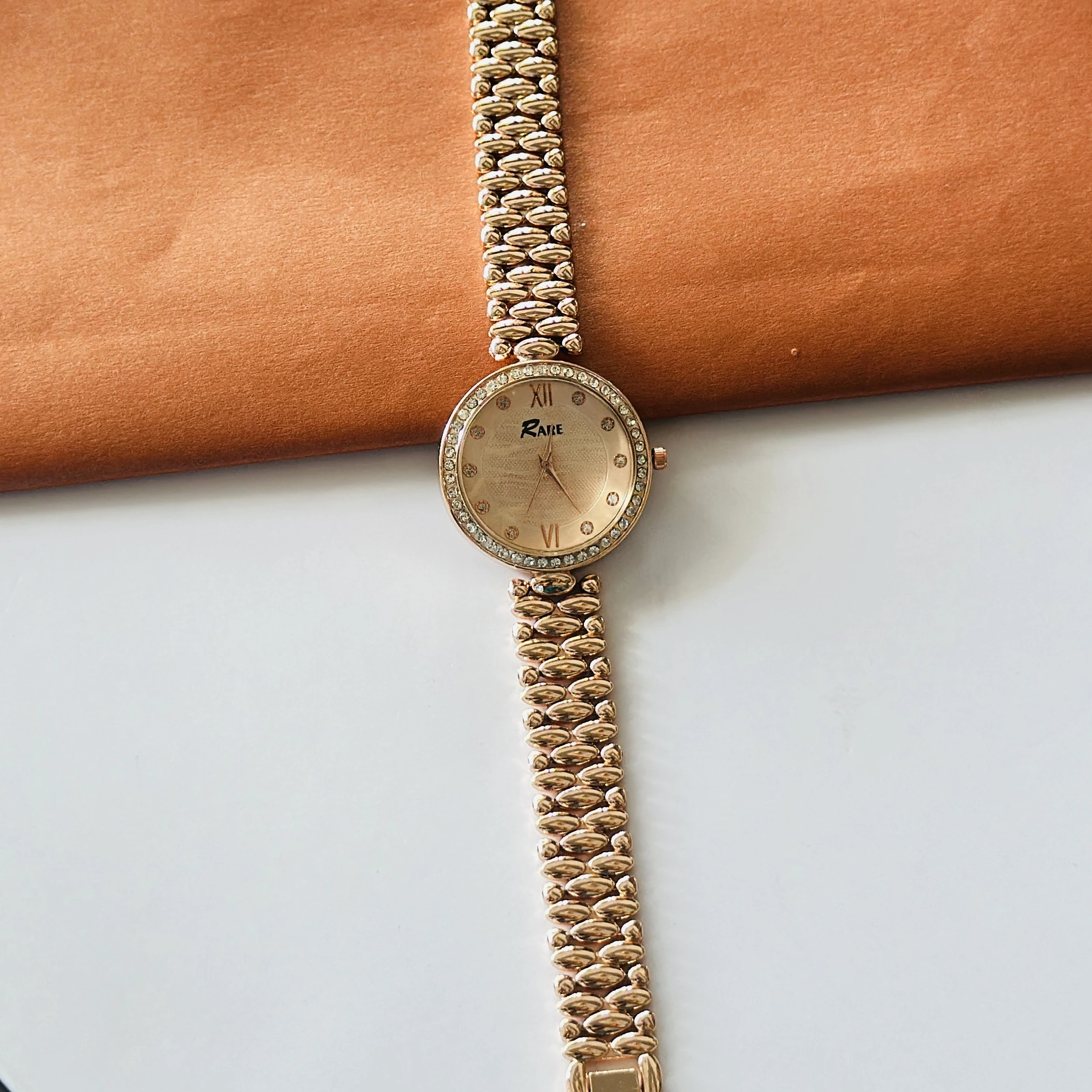Raie rose gold analog watch