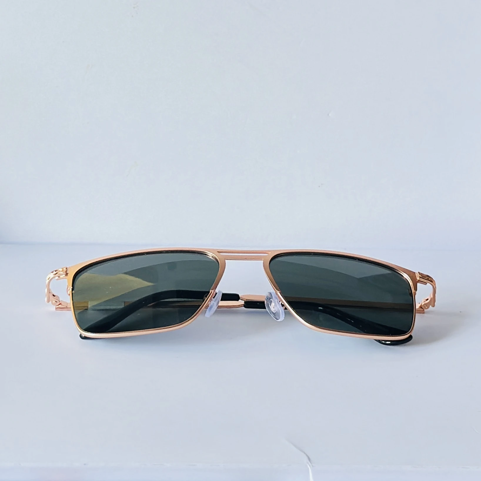 sunglasses appear to be the Vincent Chase