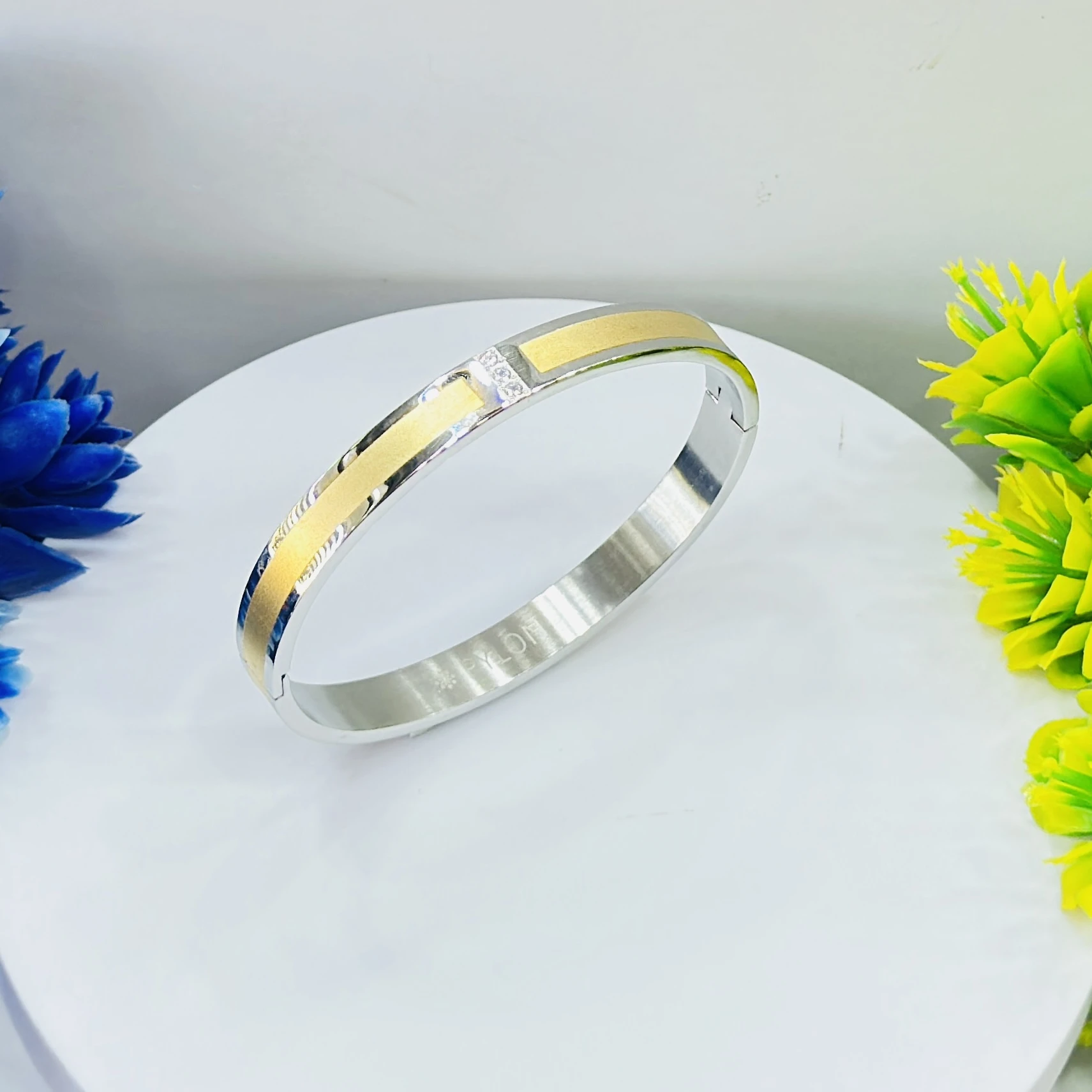 stylish two-tone kada is a stainless steel bracelet