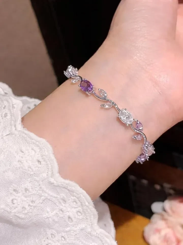 Style Kraft bracelet features a silver-plated design adorned with multi-colored tulip-shaped gems