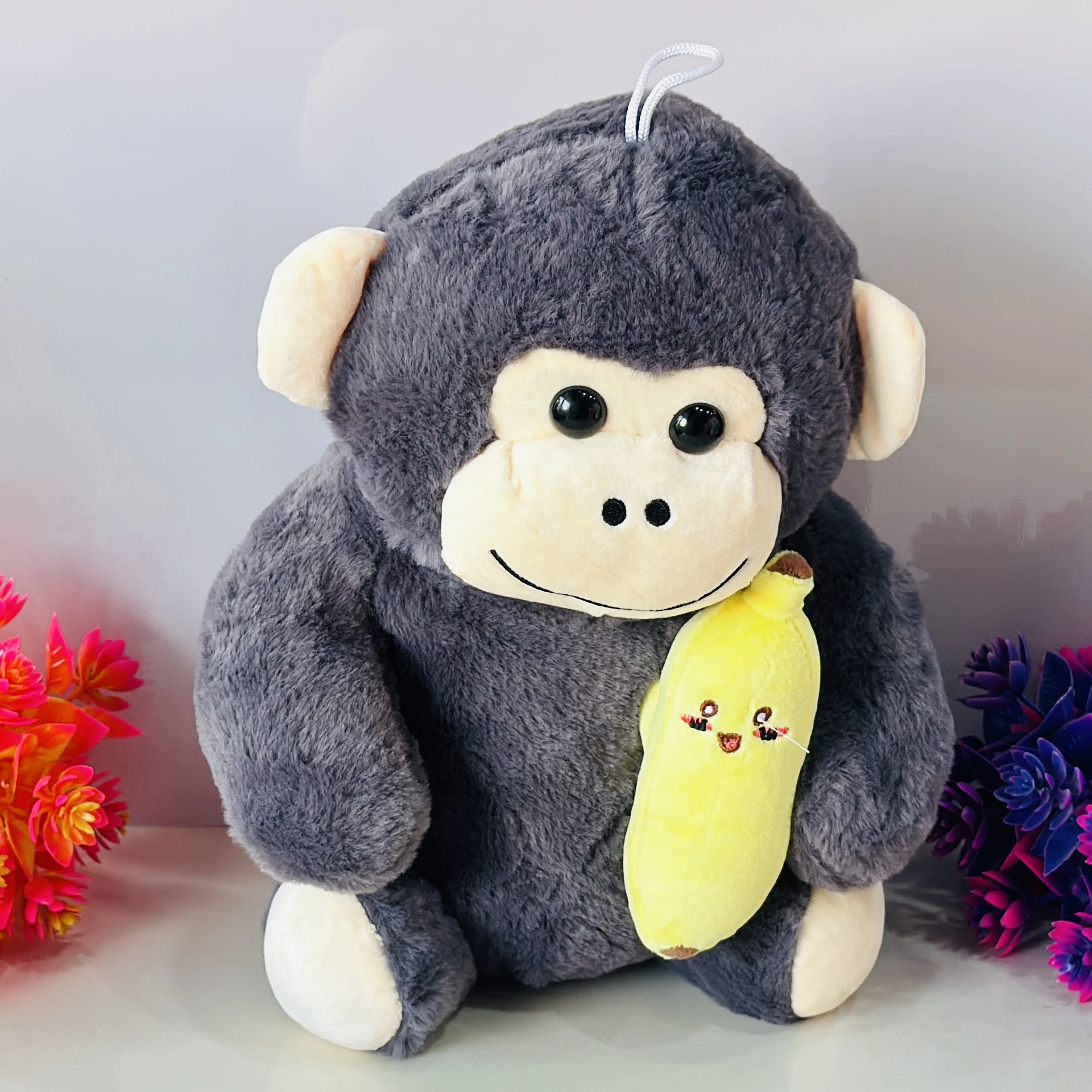Soft grey monkey plush toy