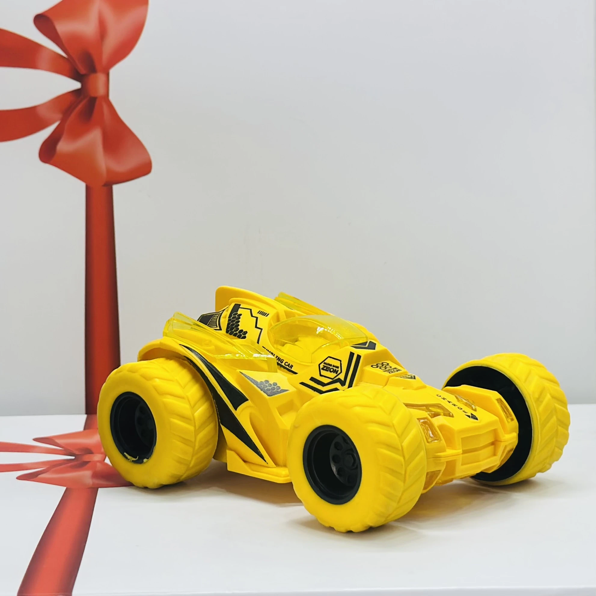 friction-powered toy stunt car