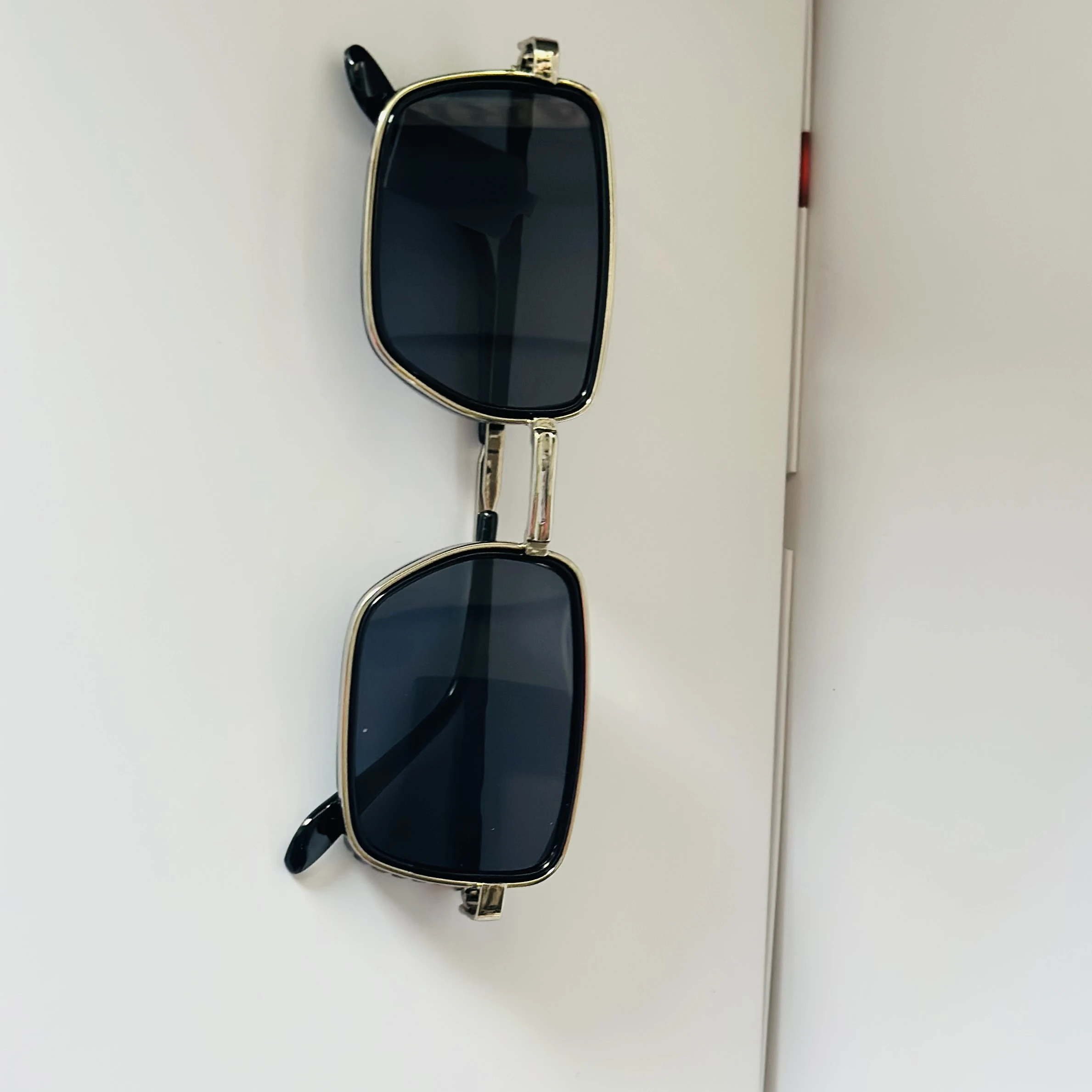 pair of Aedoll Goggle sunglasses with a gold metal frame and pink gradient lenses.