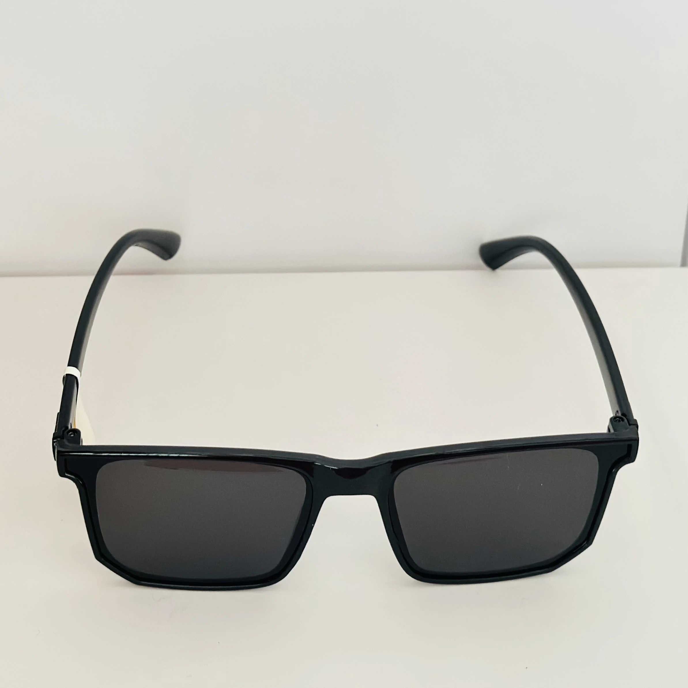 Black IRUS S1220 C1 square sunglasses with gradient lenses.