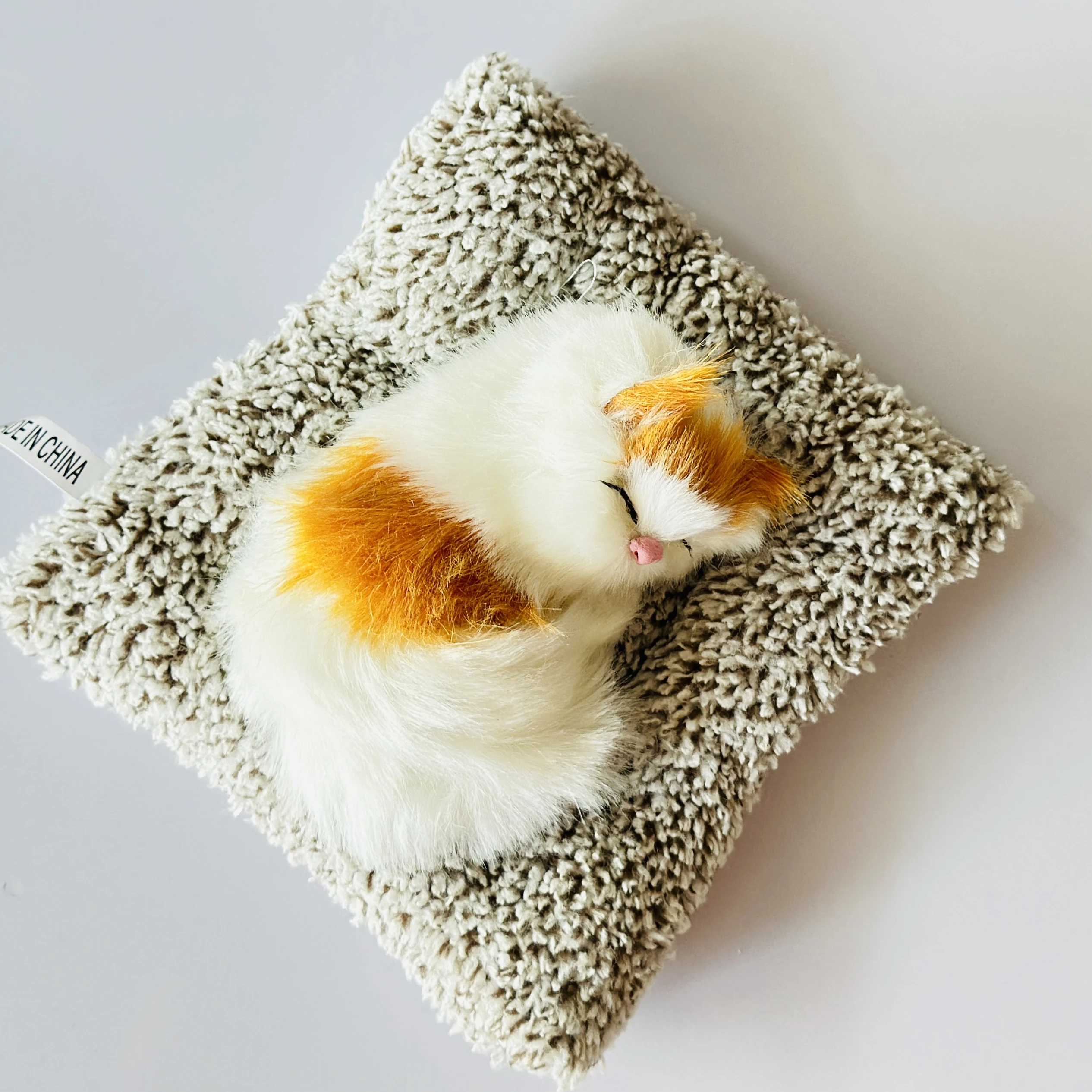 Realistic sleeping cat plush toy