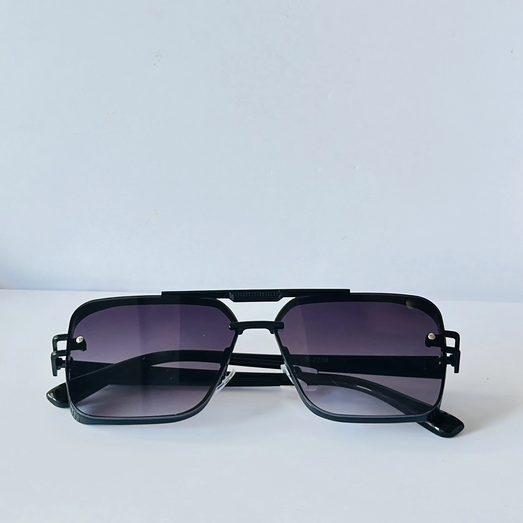 sunglasses are the Dita Mach-Six model,