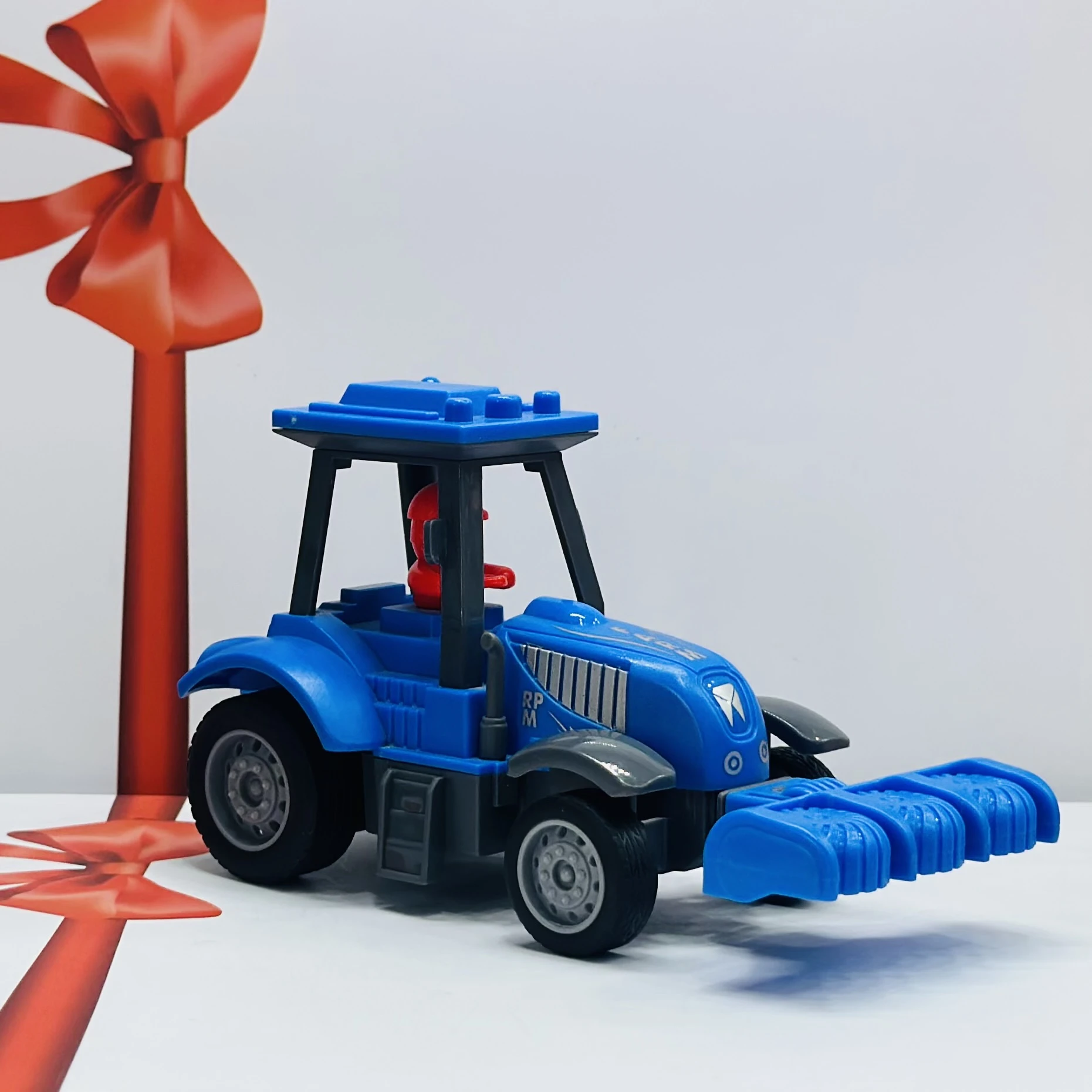 Blue plastic toy tractor