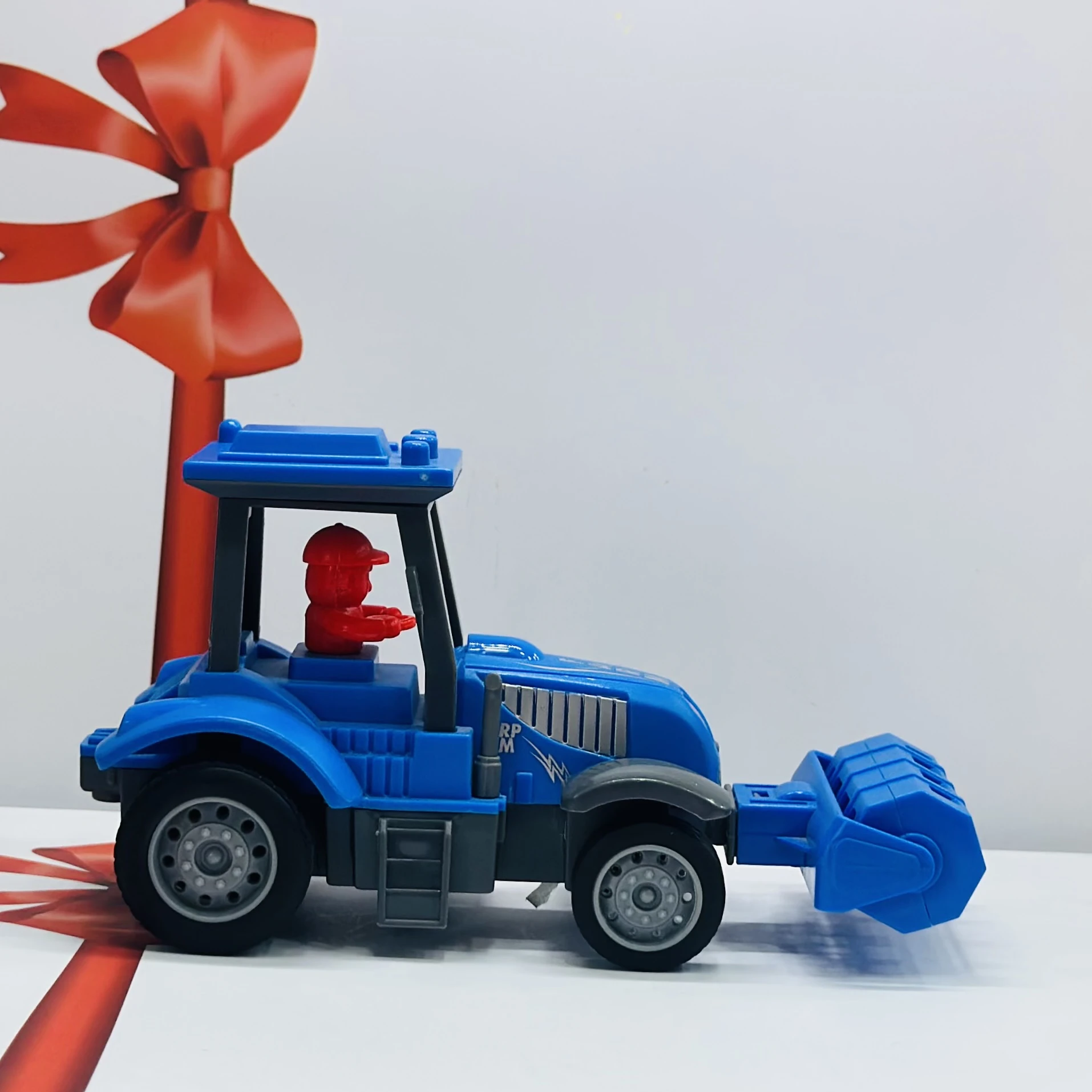 Blue plastic toy tractor