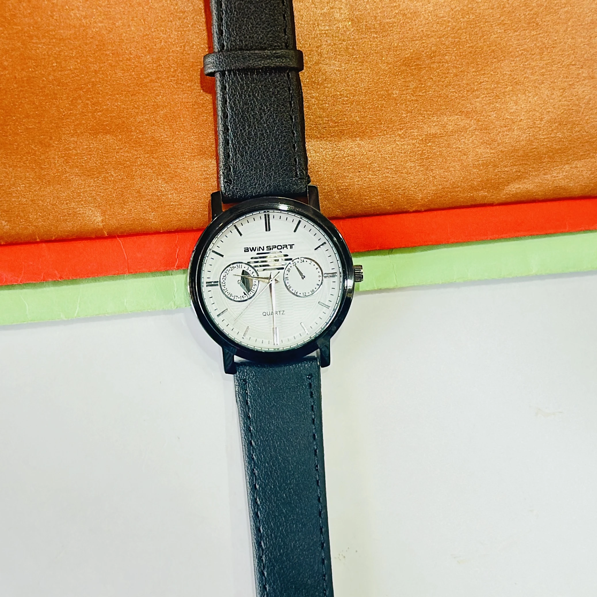 watch is a BWIN brand analog watch