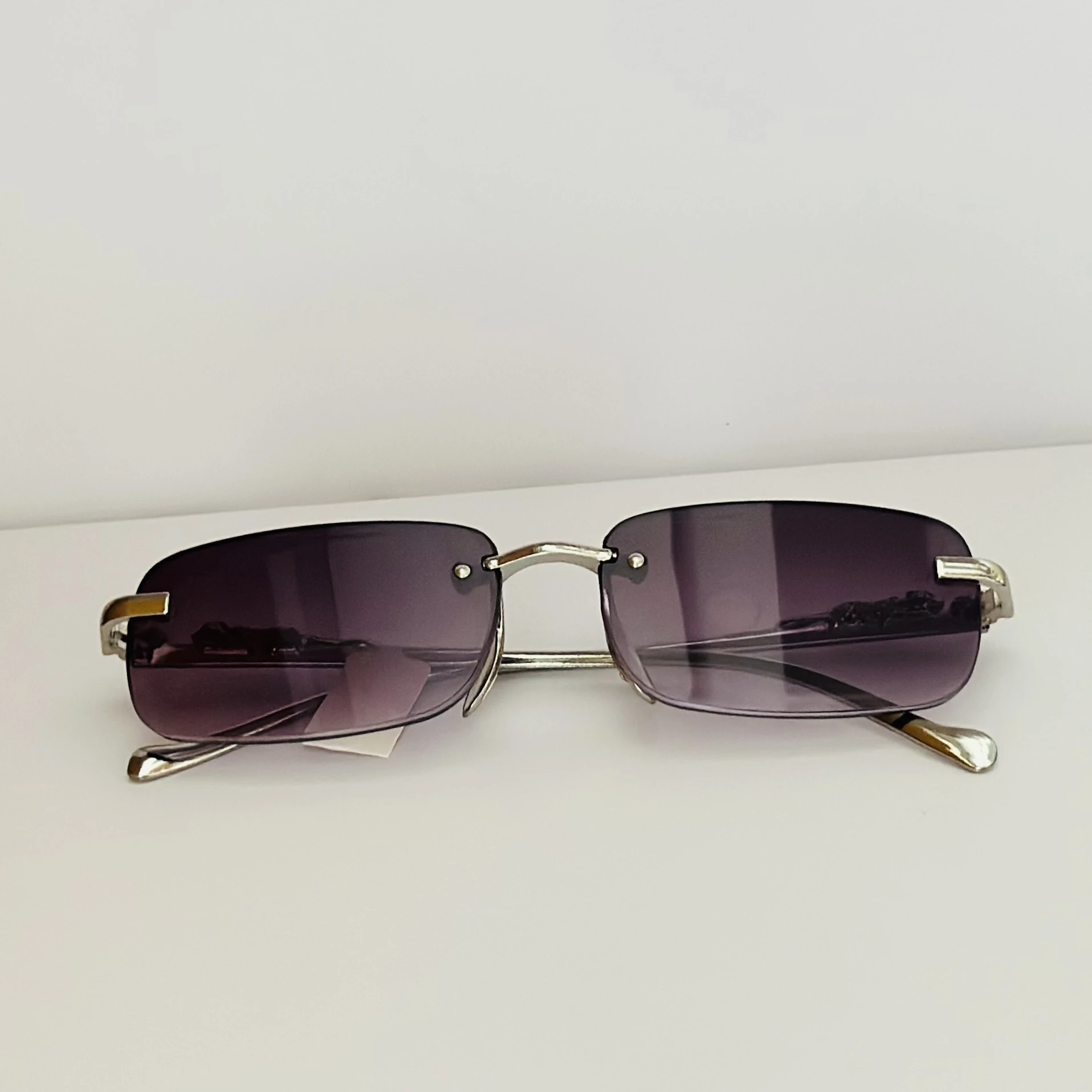 Small rimless rectangle fashion sunglasses