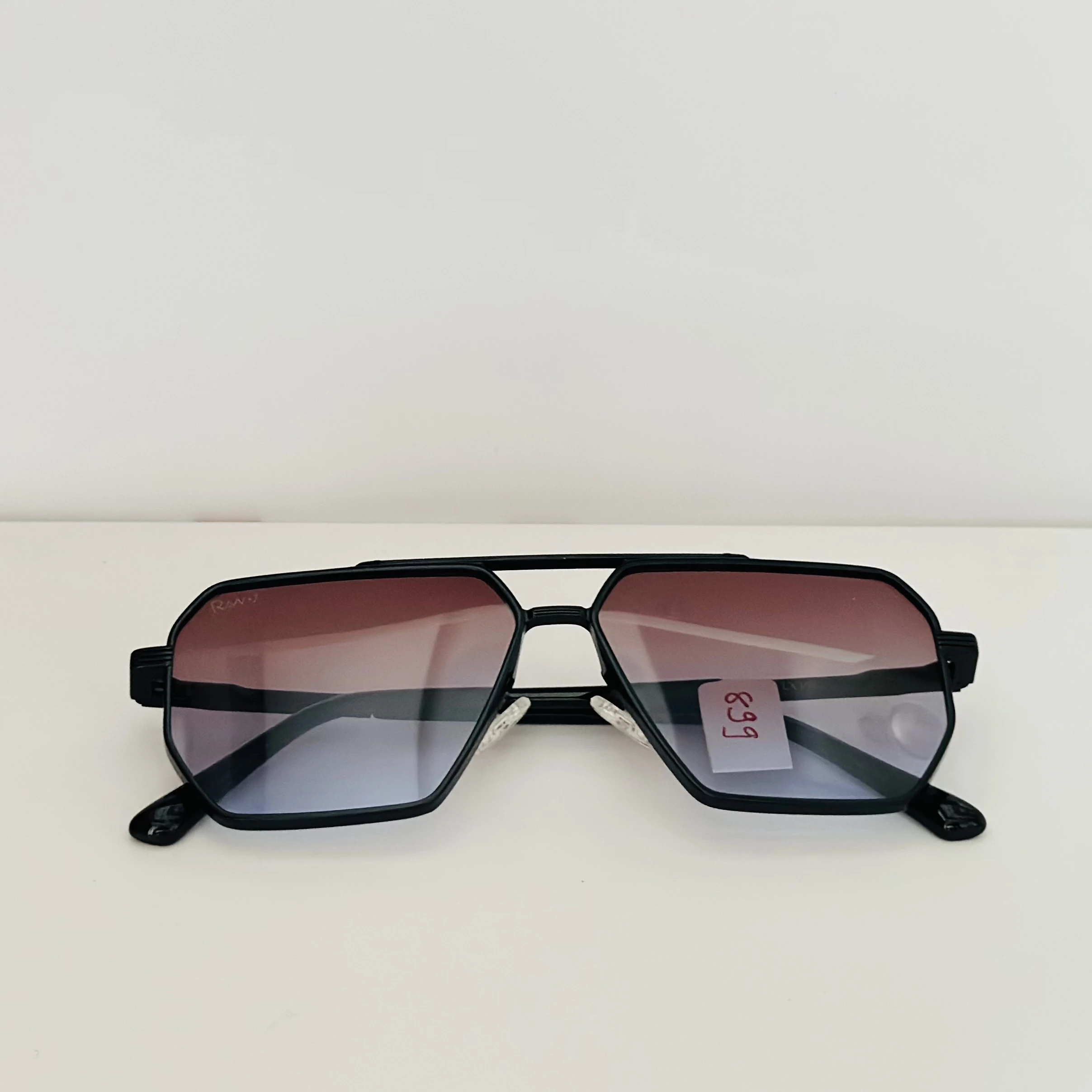 Black retro-style square sunglasses for men with gradient lenses.