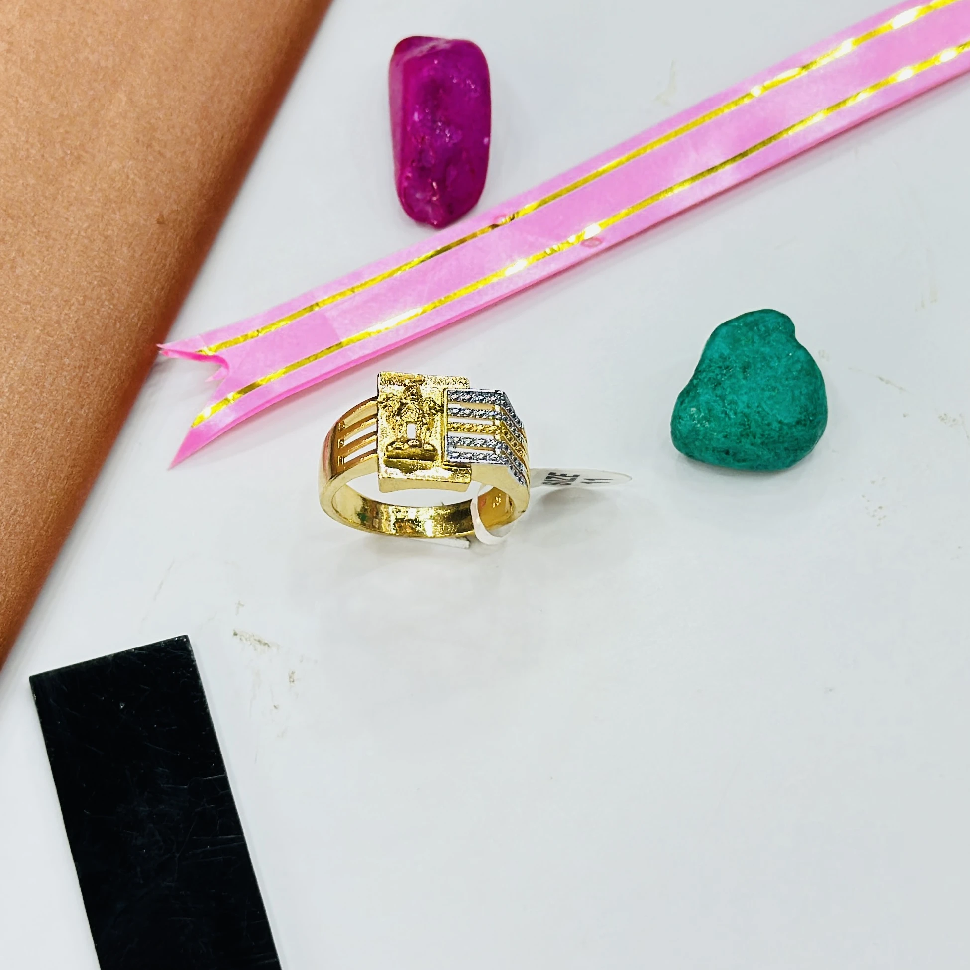 gents gold ring with American diamond embellishments