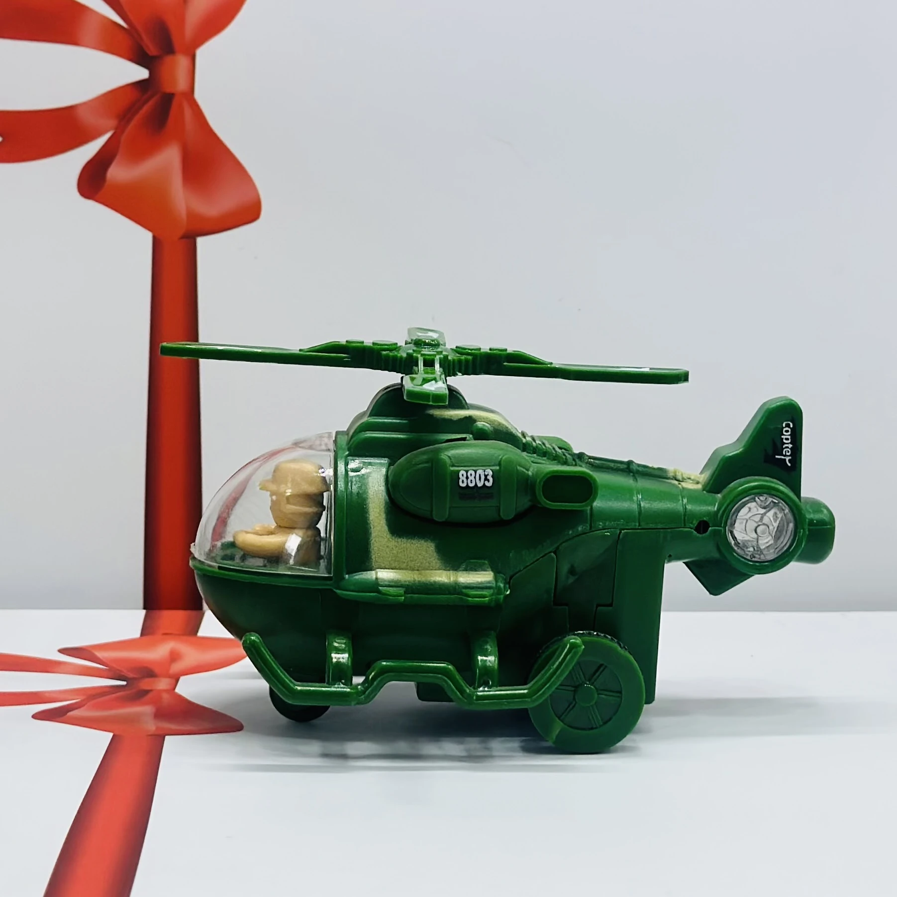 friction-powered toy helicopter